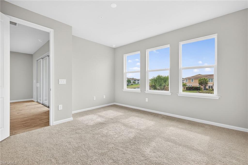 4563 Arboretum Circle, Unit 202 Naples, FL 34112 - Photo 11 of 22 master Bedroom