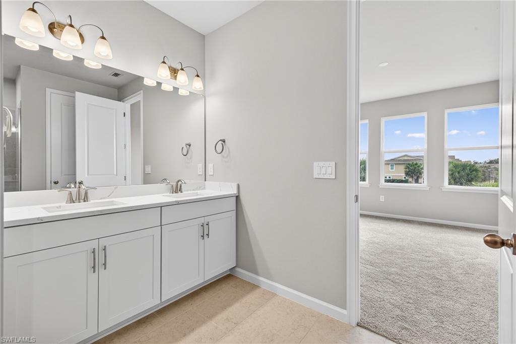 4563 Arboretum Circle, Unit 202 Naples, FL 34112 - Photo 13 of 22 Master Bathroom