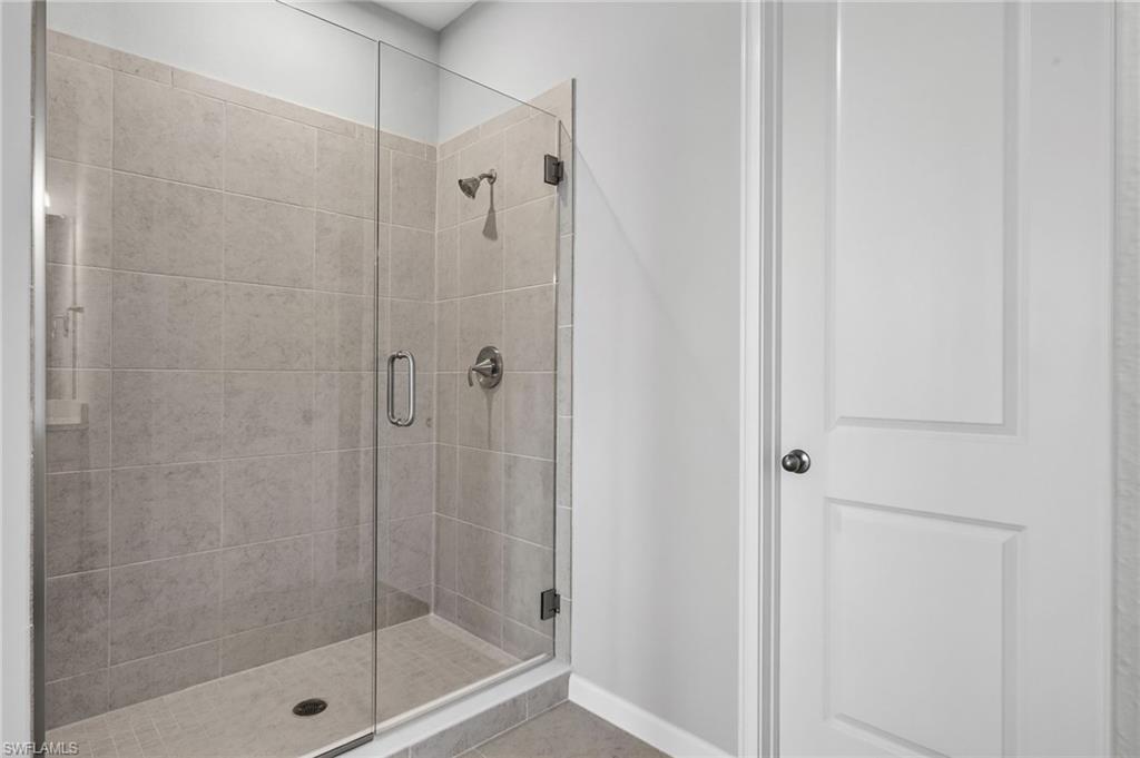 4563 Arboretum Circle, Unit 202 Naples, FL 34112 - Photo 15 of 22 Master Shower