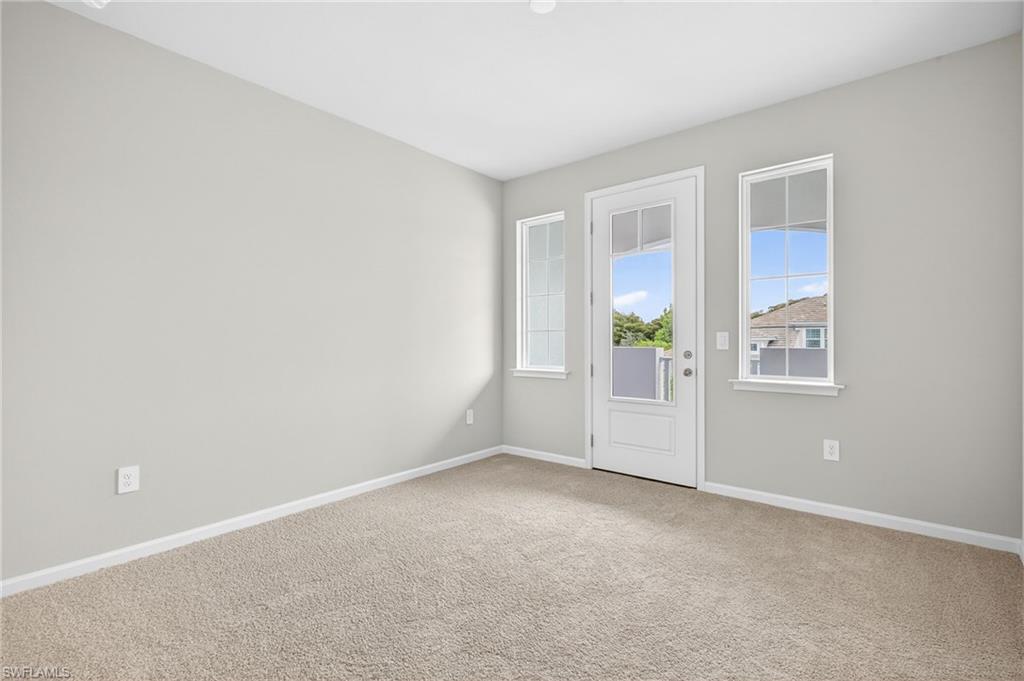 4563 Arboretum Circle, Unit 202 Naples, FL 34112 - Photo 16 of 22 Guest Bedroom