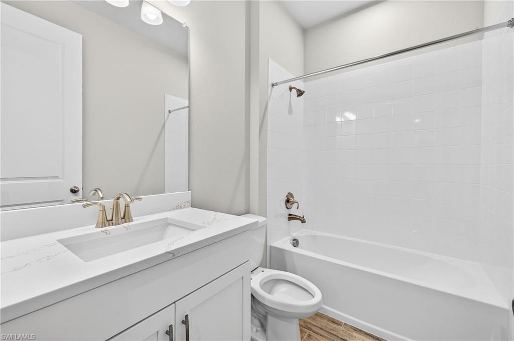 4563 Arboretum Circle, Unit 202 Naples, FL 34112 - Photo 17 of 22 Guest bathroom