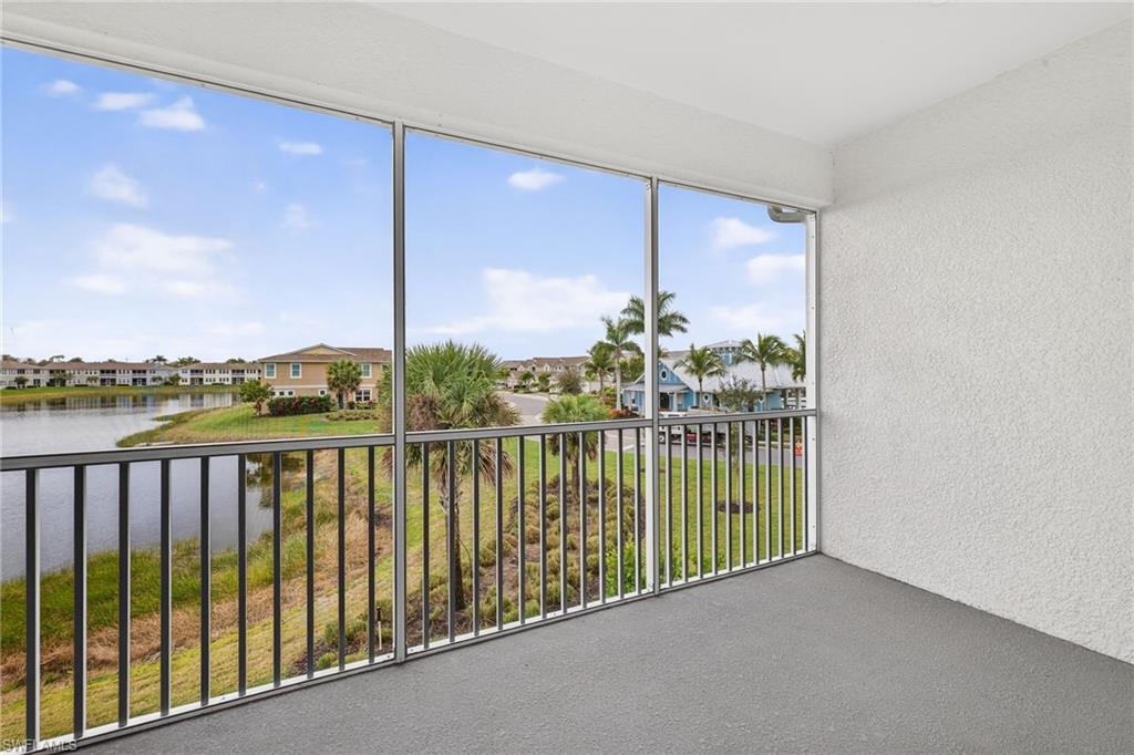 4563 Arboretum Circle, Unit 202 Naples, FL 34112 - Photo 18 of 22 Balcony with water view