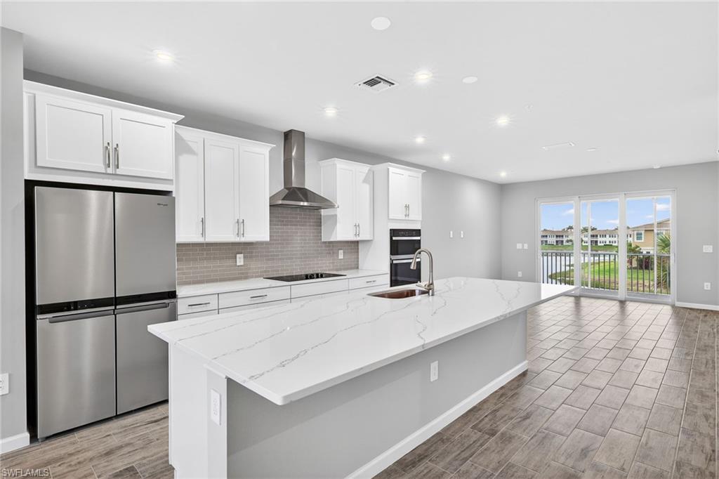 4563 Arboretum Circle, Unit 202 Naples, FL 34112 - Photo 4 of 22 kitchen