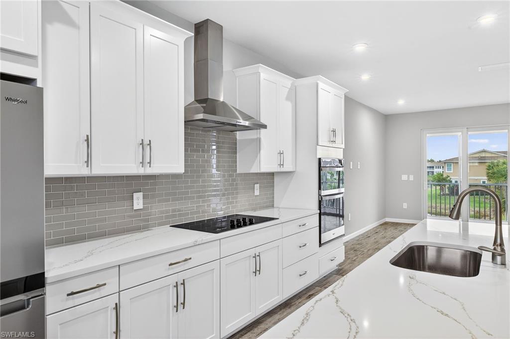 4563 Arboretum Circle, Unit 202 Naples, FL 34112 - Photo 5 of 22 kitchen