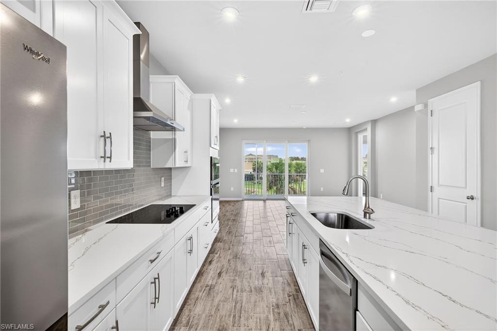 4563 Arboretum Circle, Unit 202 Naples, FL 34112 - Photo 6 of 22 kitchen