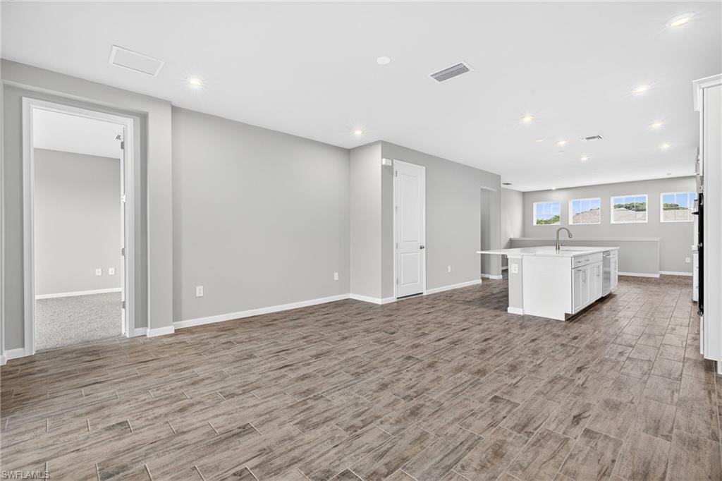 4563 Arboretum Circle, Unit 202 Naples, FL 34112 - Photo 8 of 22 Open living area