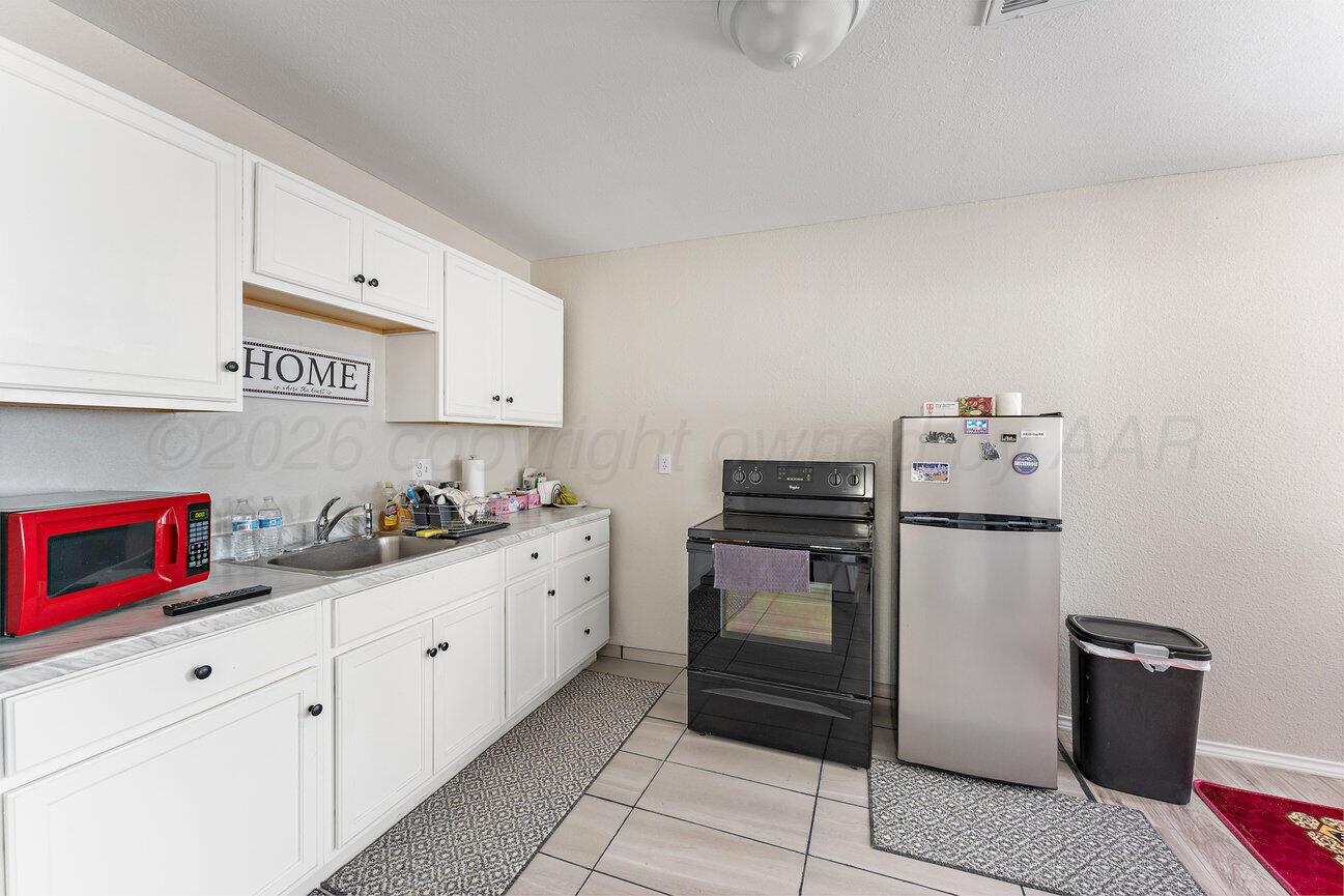 14301 White Tail Avenue Amarillo, TX 79124 - Photo 28 of 67 APartment Kitchen