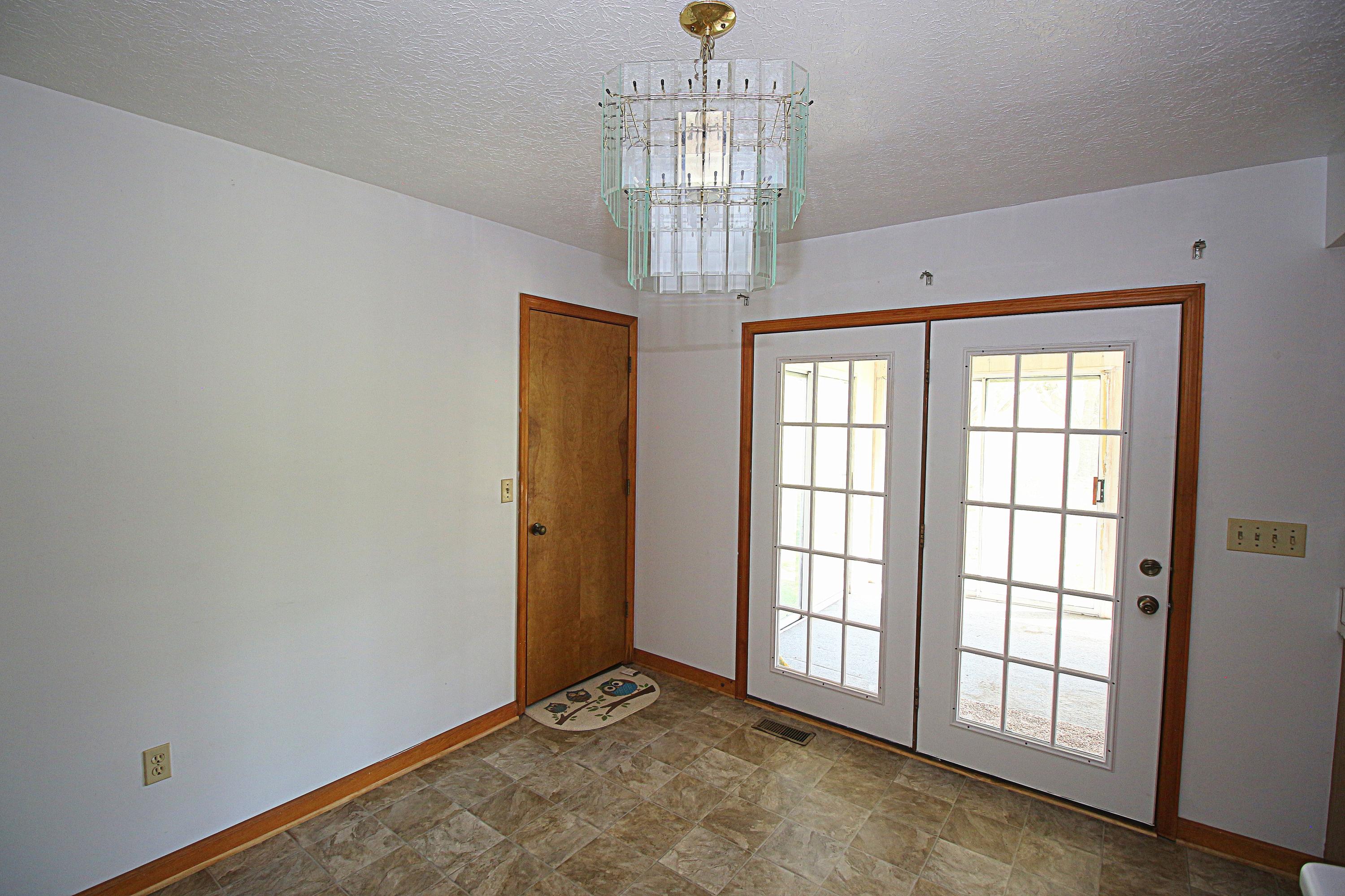 7080 Belspring Road Radford, VA 24141 - Photo 15 of 53 a view of an empty room with a window