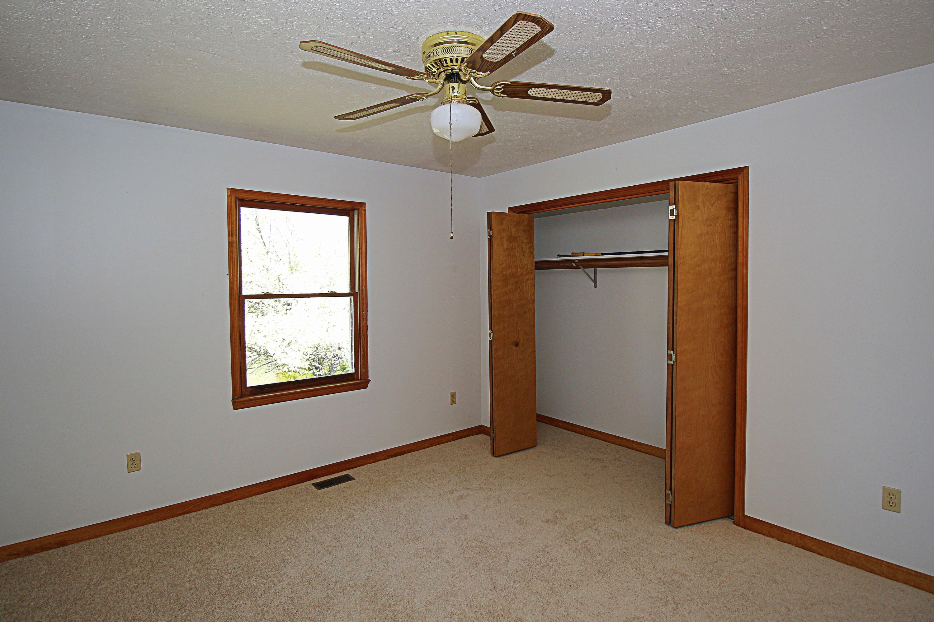 7080 Belspring Road Radford, VA 24141 - Photo 24 of 53 a view of an empty room with a window