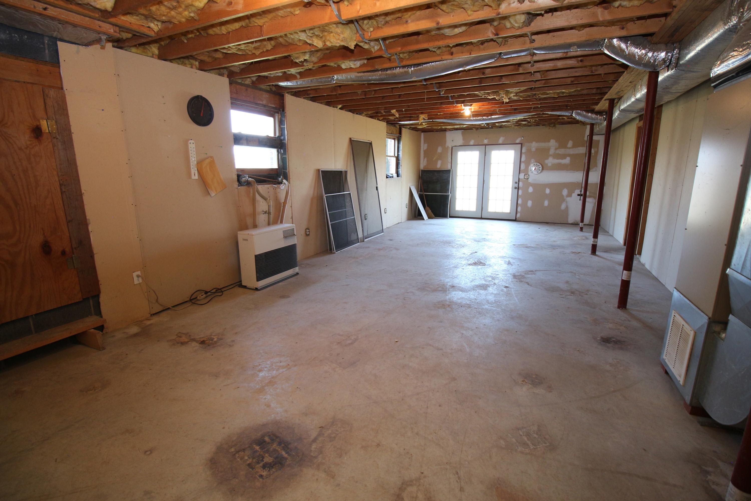 7080 Belspring Road Radford, VA 24141 - Photo 30 of 53 a view of an empty room with a fireplace
