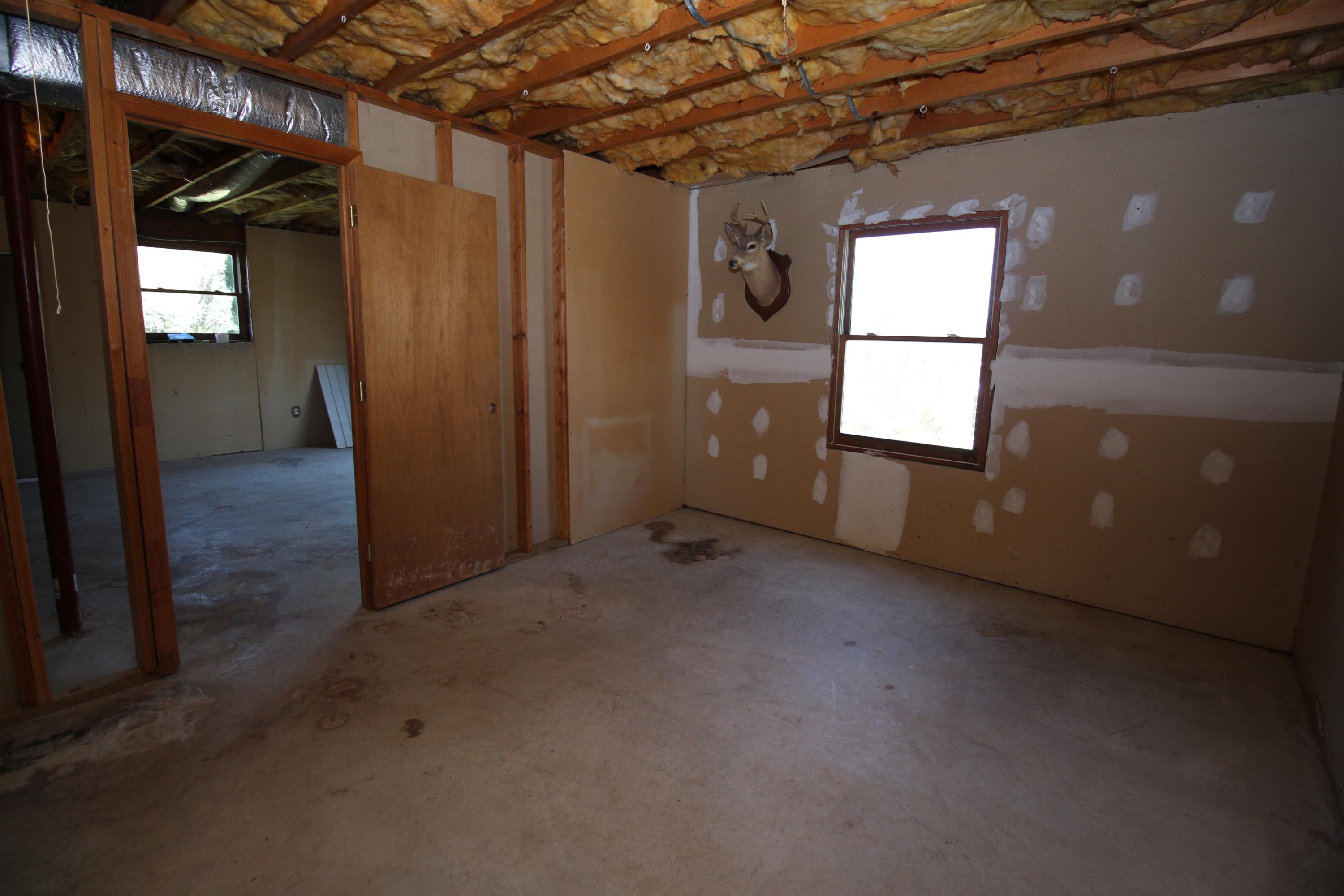 7080 Belspring Road Radford, VA 24141 - Photo 32 of 53 an empty room with windows