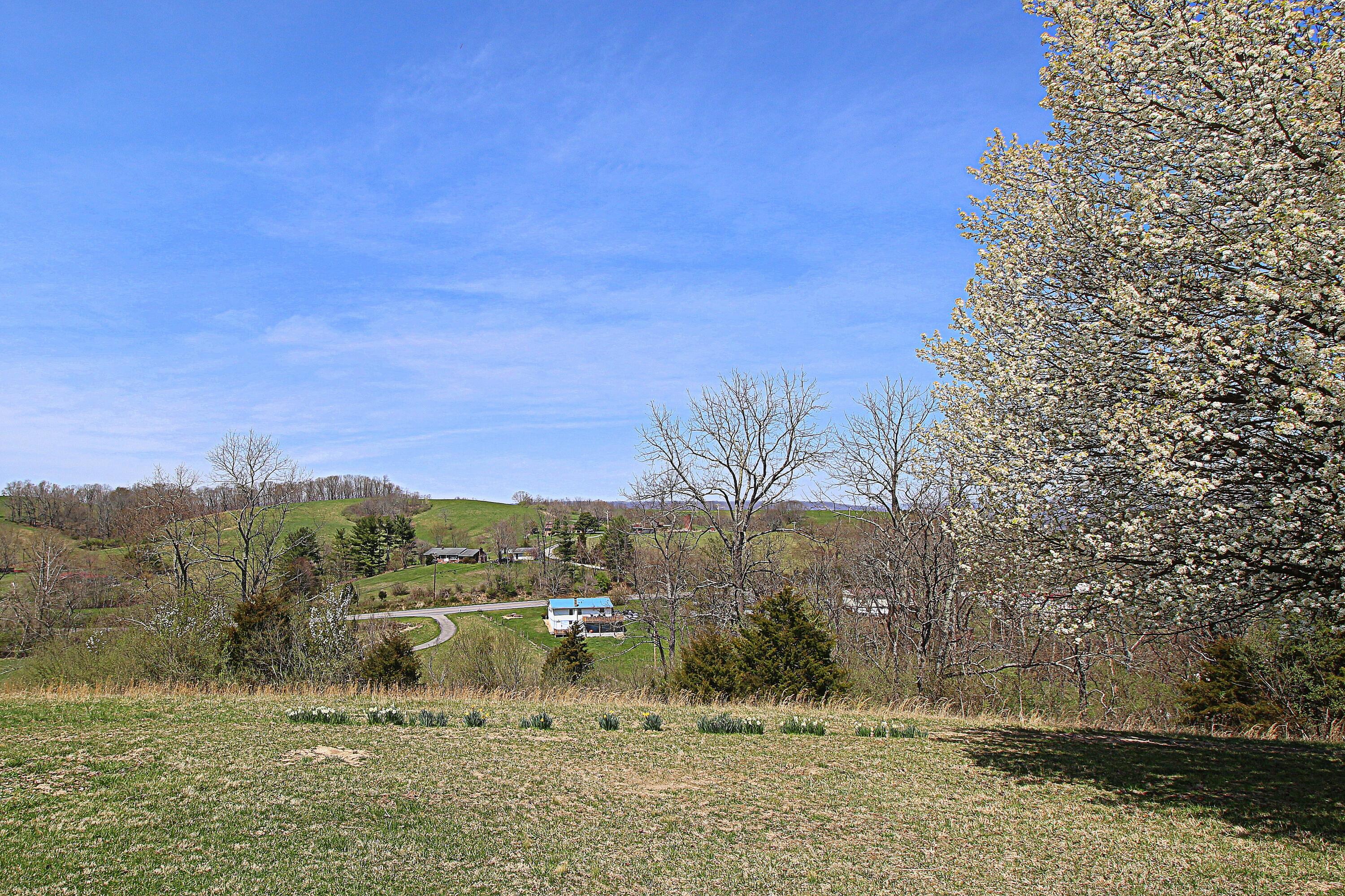 7080 Belspring Road Radford, VA 24141 - Photo 39 of 53 a view of a town with mountains in the background