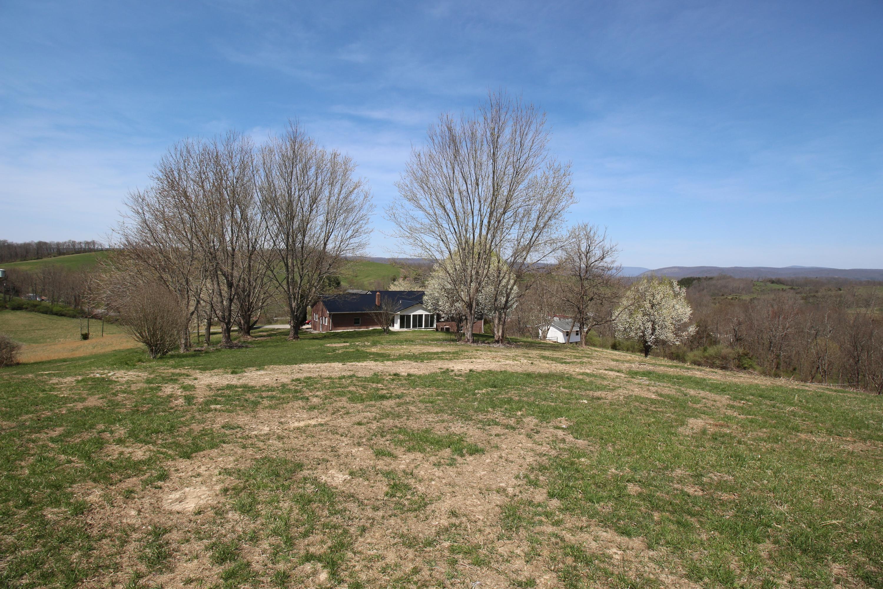 7080 Belspring Road Radford, VA 24141 - Photo 46 of 53 a view of a yard with a house
