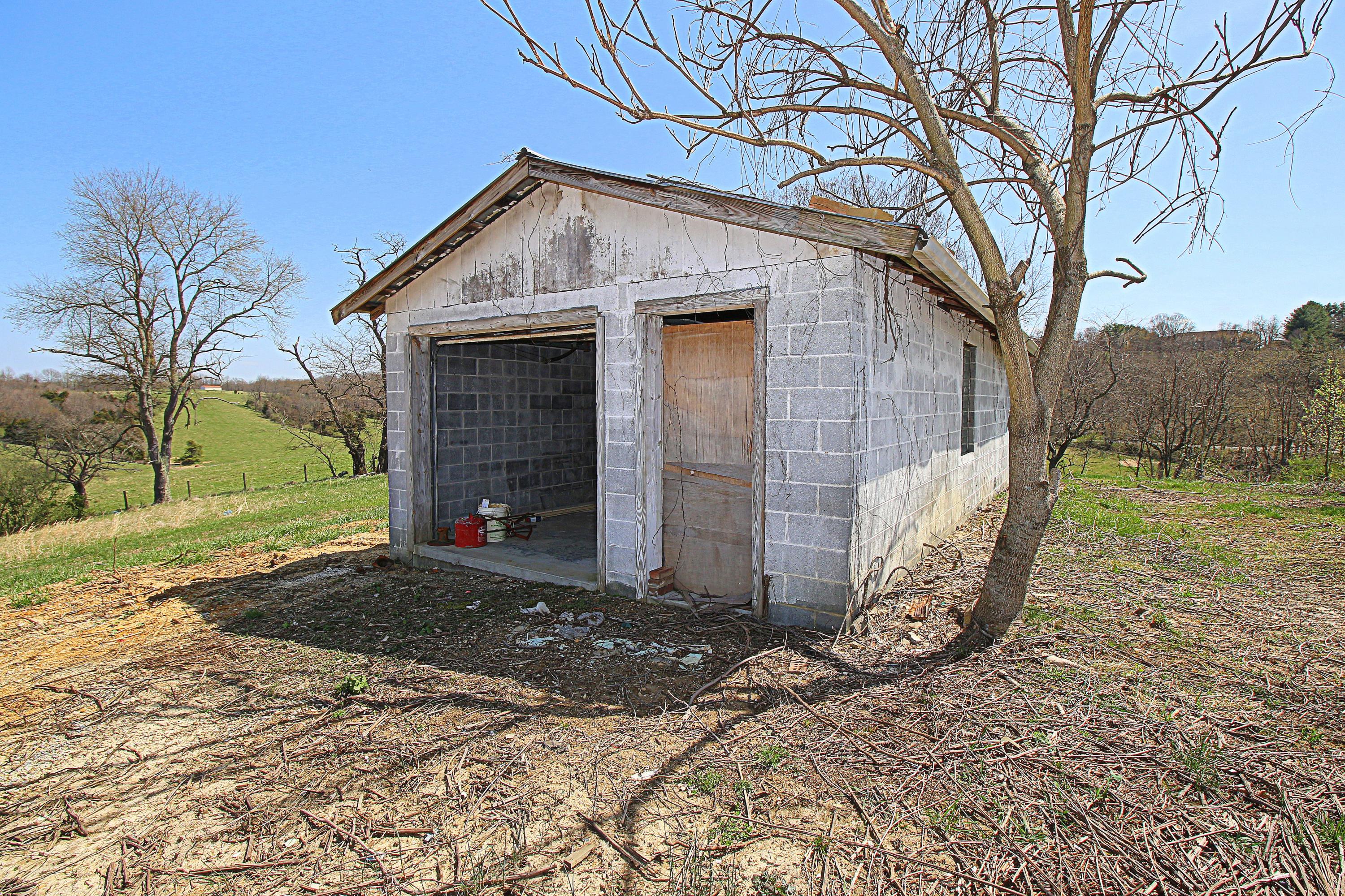 7080 Belspring Road Radford, VA 24141 - Photo 48 of 53 a view of a house with a yard