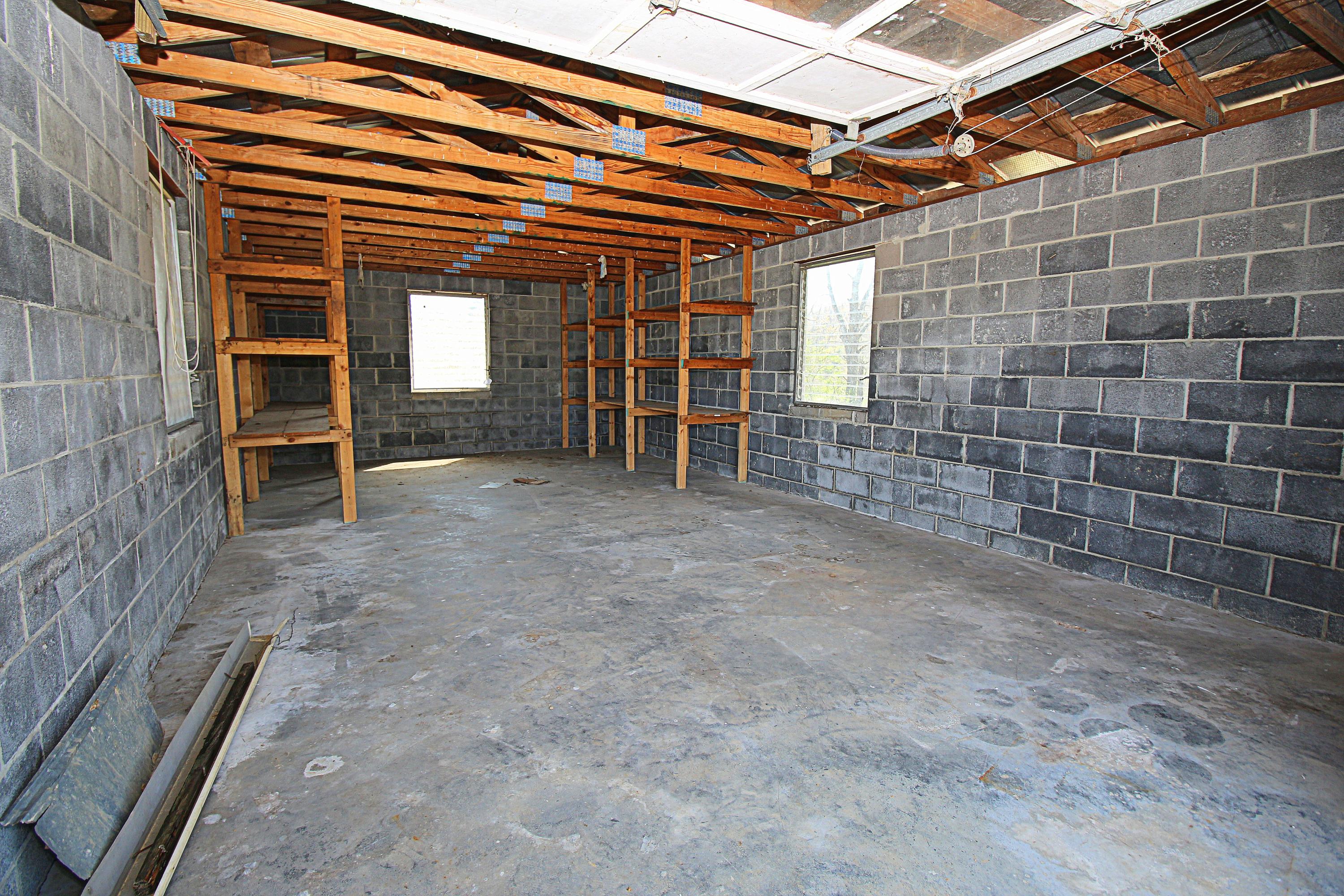 7080 Belspring Road Radford, VA 24141 - Photo 49 of 53 a view of an empty room with wooden walls