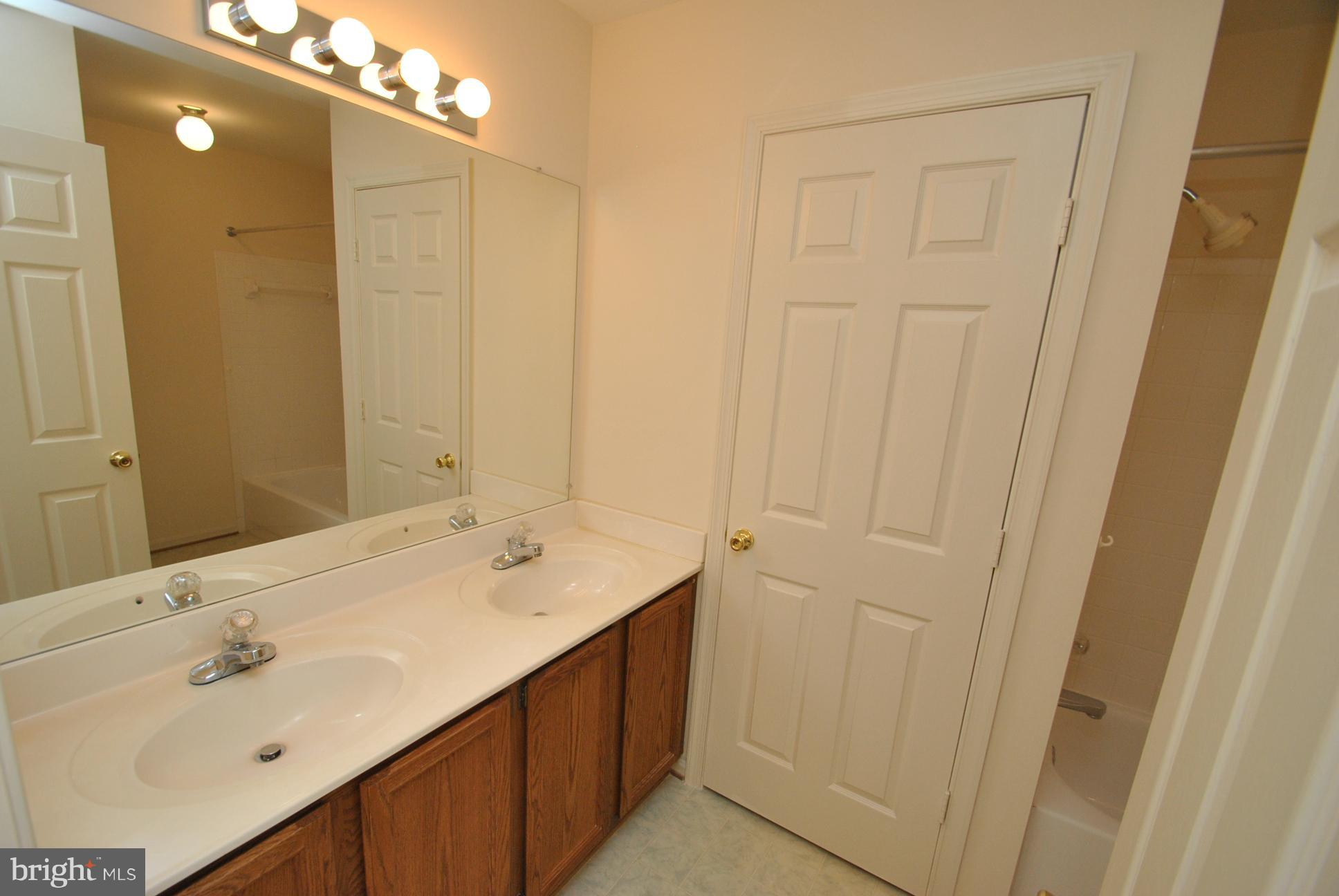 4458 Cole Farm Road Baltimore, MD 21236 - Photo 14 of 25 OWNERS SUITE FULL BATH - DOUBLE VANITIES