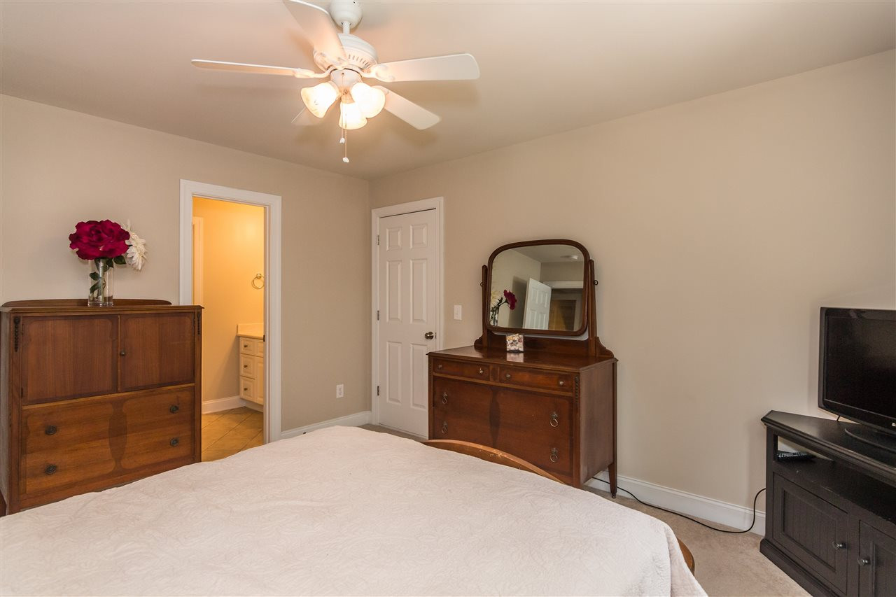 1132 Rhea Drive Garner, NC 27529 - Photo 17 of 25 This roomy bedrooms provides access to another storage area, complete with shelving for easy storage of those things you don't need today but aren't quite ready to part with! Bedroom