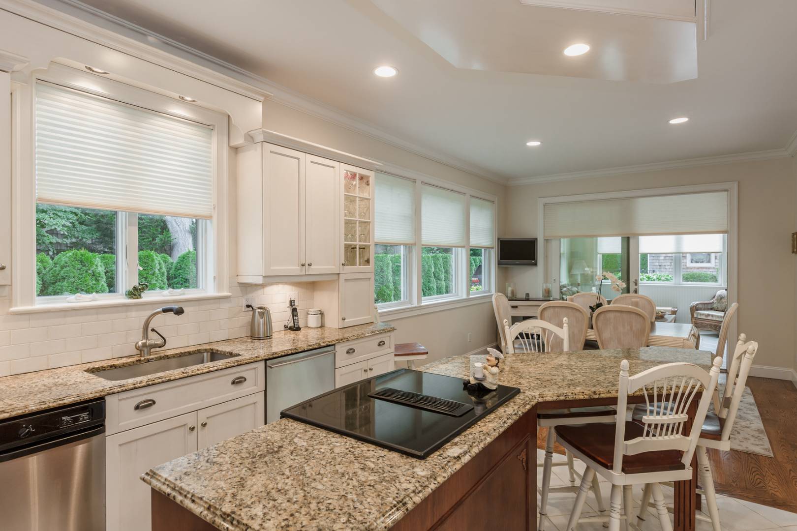91 Beach Road Westhampton Beach, NY 11978 - Photo 11 of 23 a kitchen with a stove a sink and a refrigerator