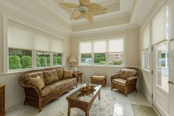a living room with furniture and a window