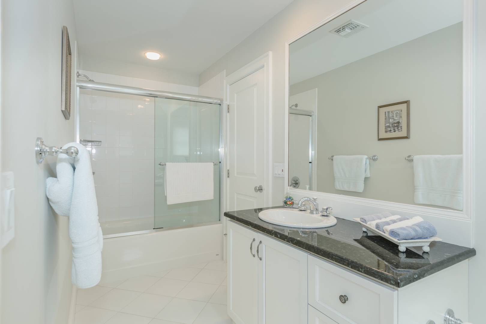 91 Beach Road Westhampton Beach, NY 11978 - Photo 20 of 23 a bathroom with a sink and a mirror