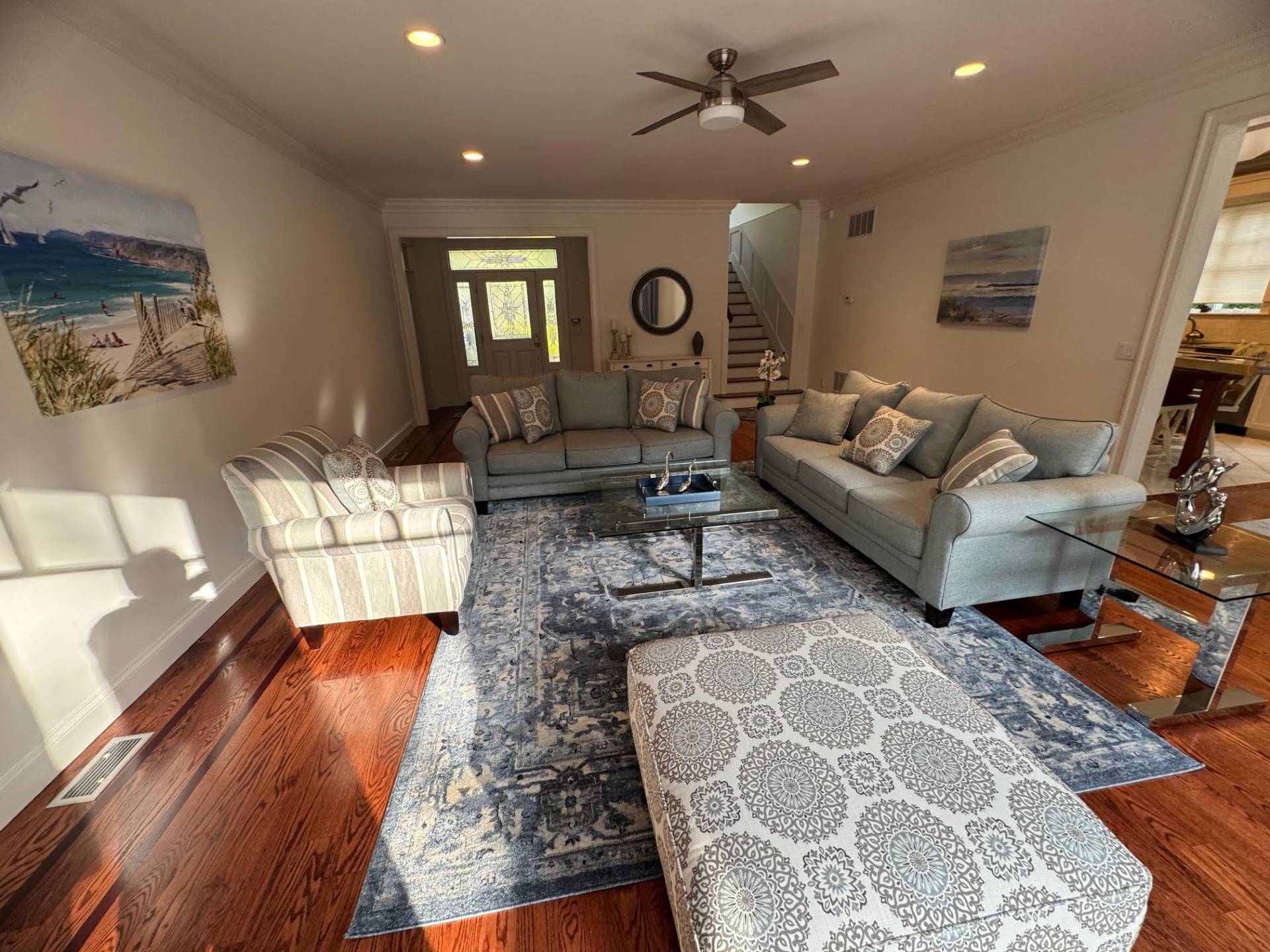 91 Beach Road Westhampton Beach, NY 11978 - Photo 5 of 23 a living room with furniture and a rug