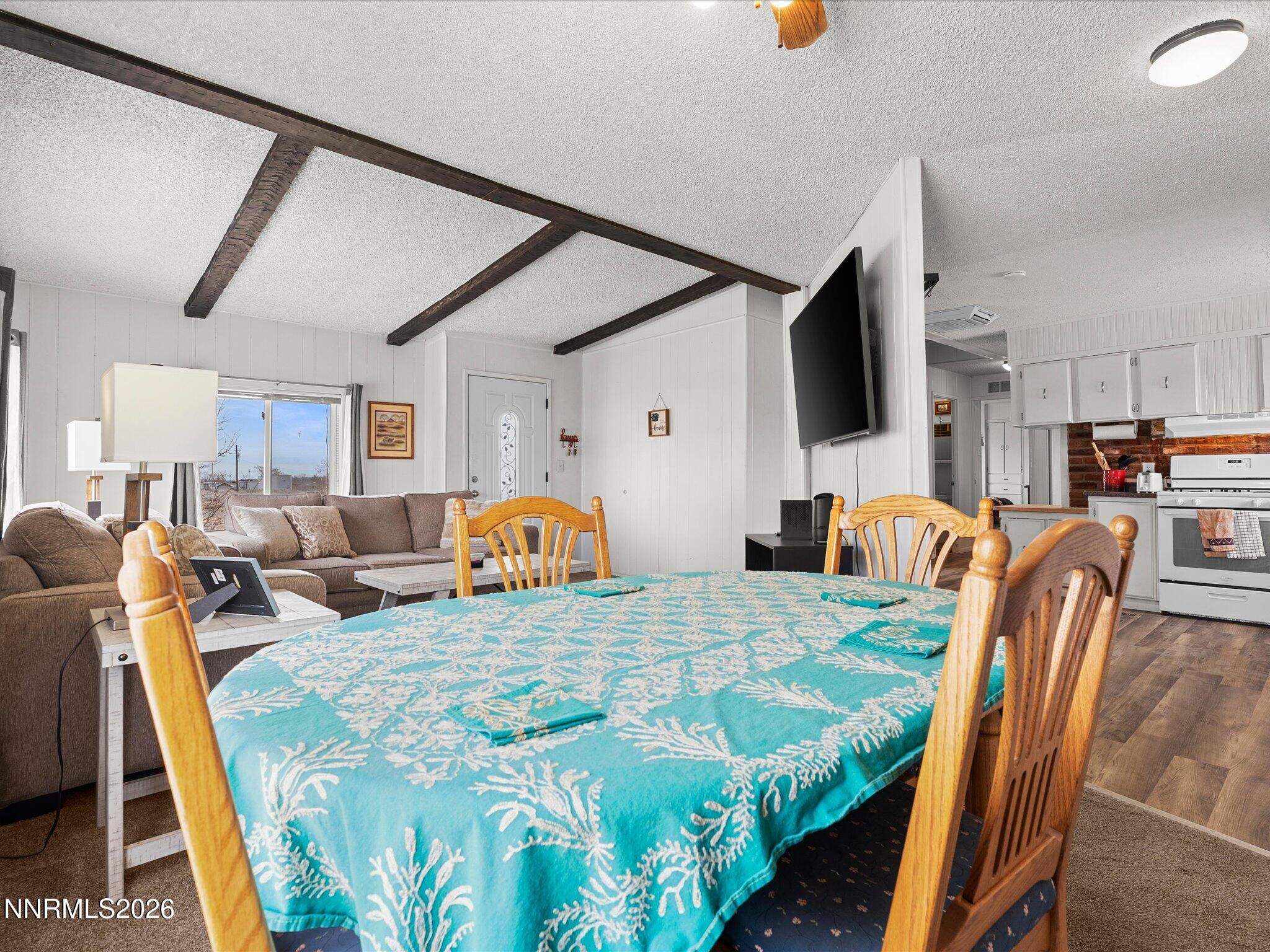 7815 Springfield Road Silver Springs, NV 89429 - Photo 12 of 46 a view of a dining room with furniture