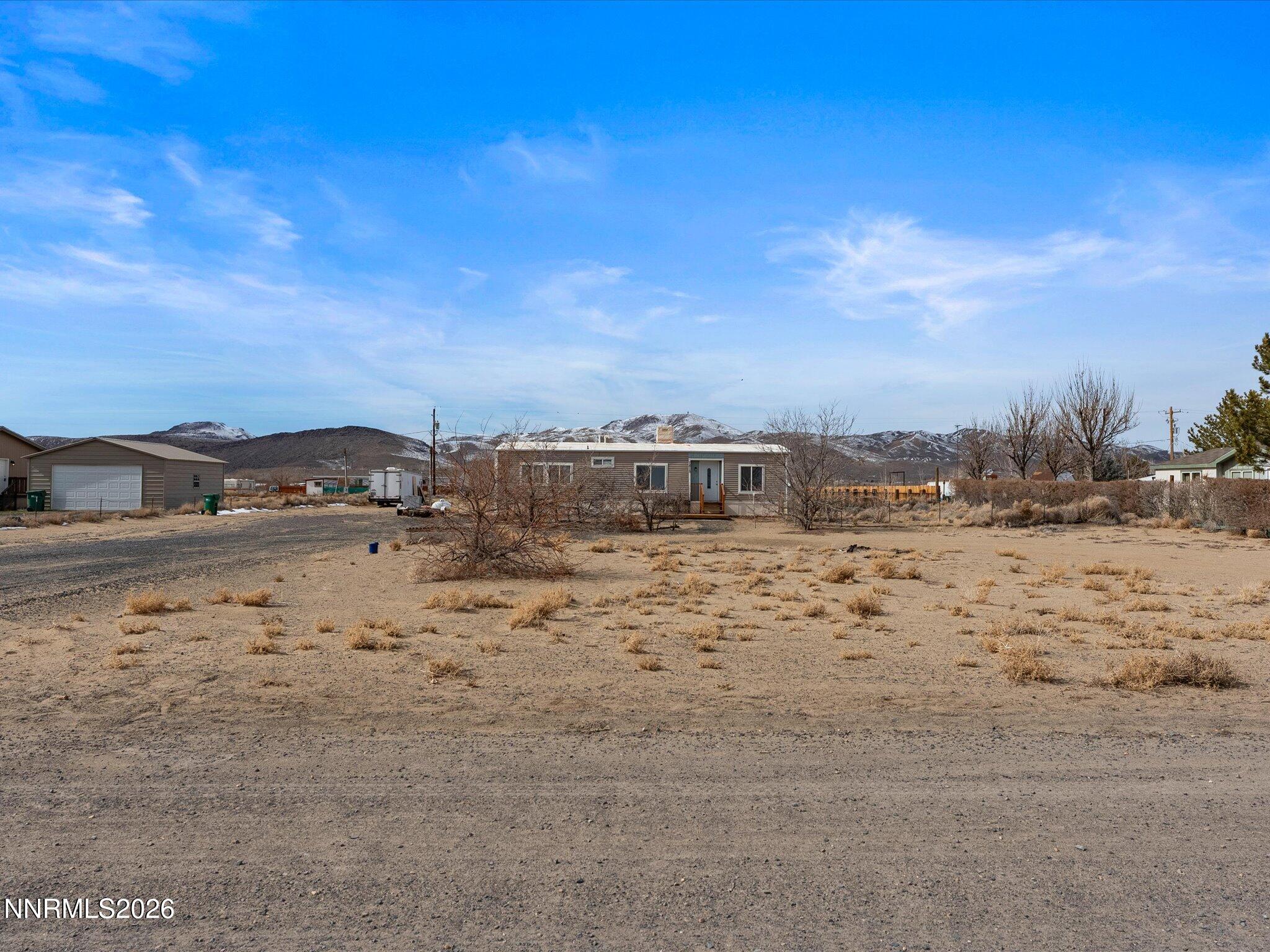 7815 Springfield Road Silver Springs, NV 89429 - Photo 5 of 46 a view of ocean view with beach