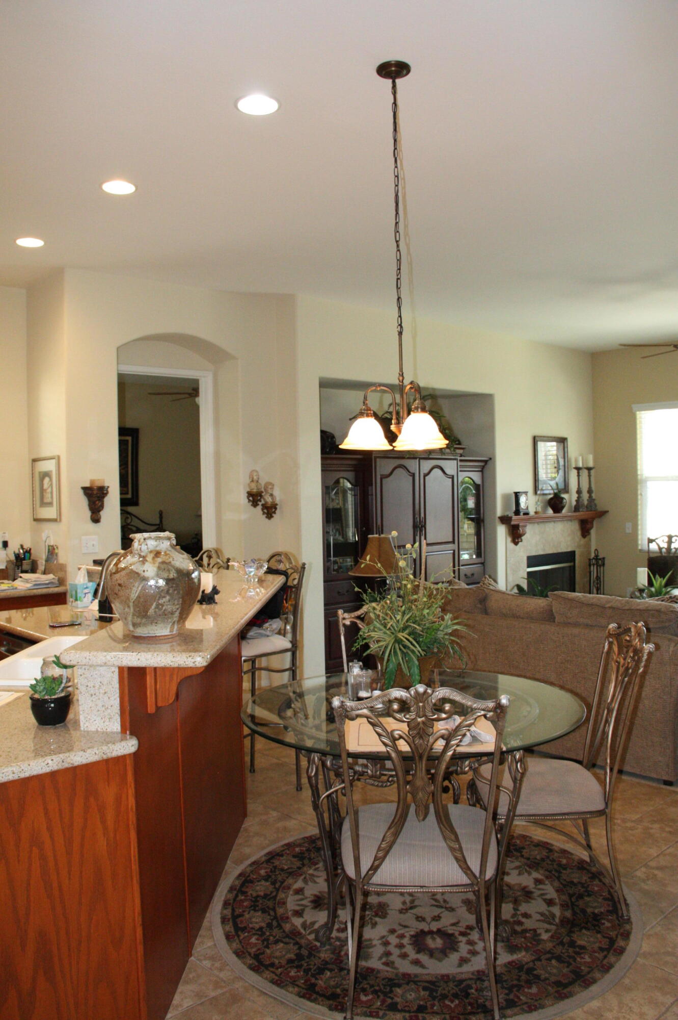 49758 Lewis Road Indio, CA 92201 - Photo 14 of 47 a view of a dining room with furniture window and wooden floor