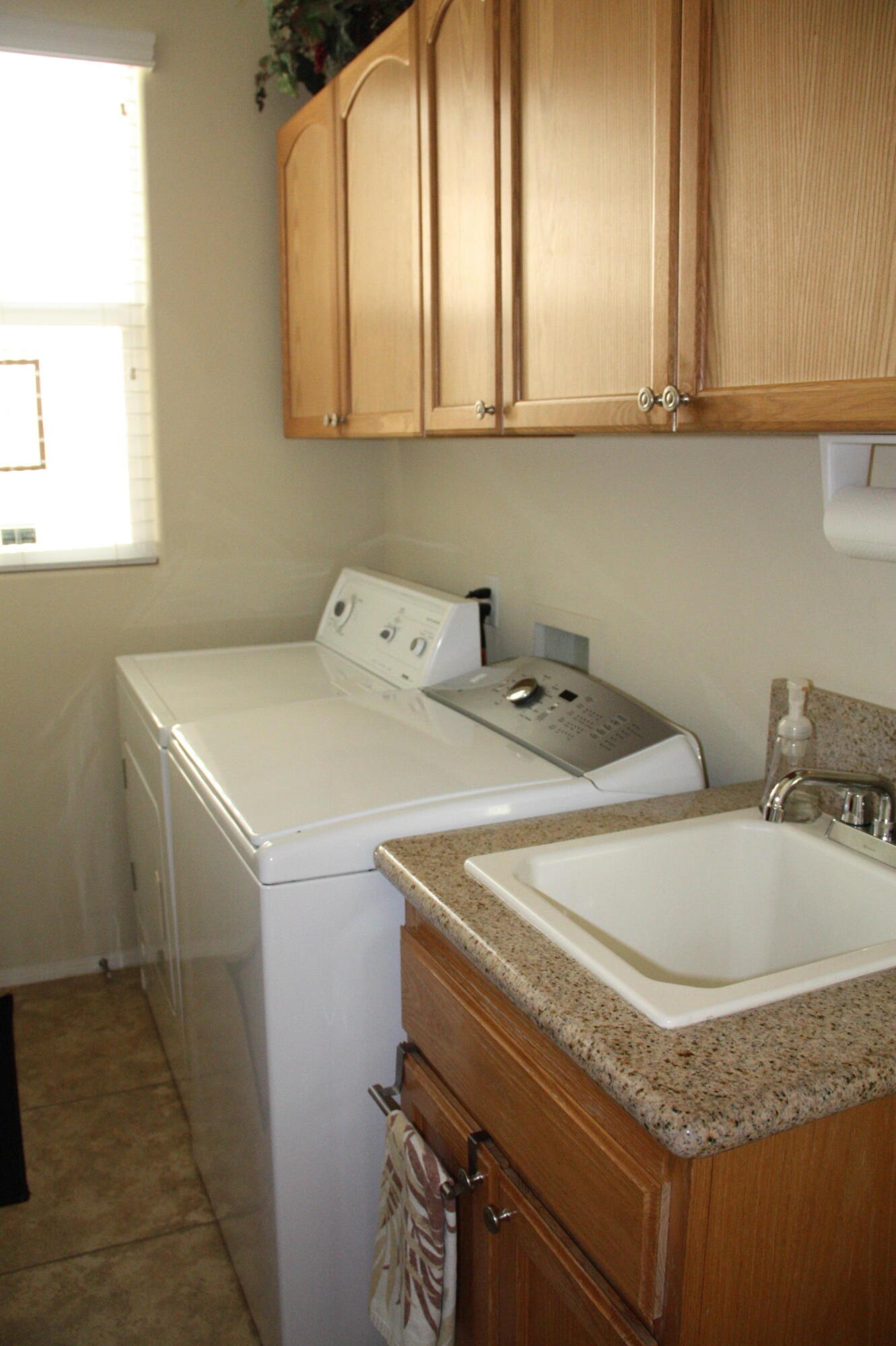 49758 Lewis Road Indio, CA 92201 - Photo 15 of 47 a utility room with dryer and washer