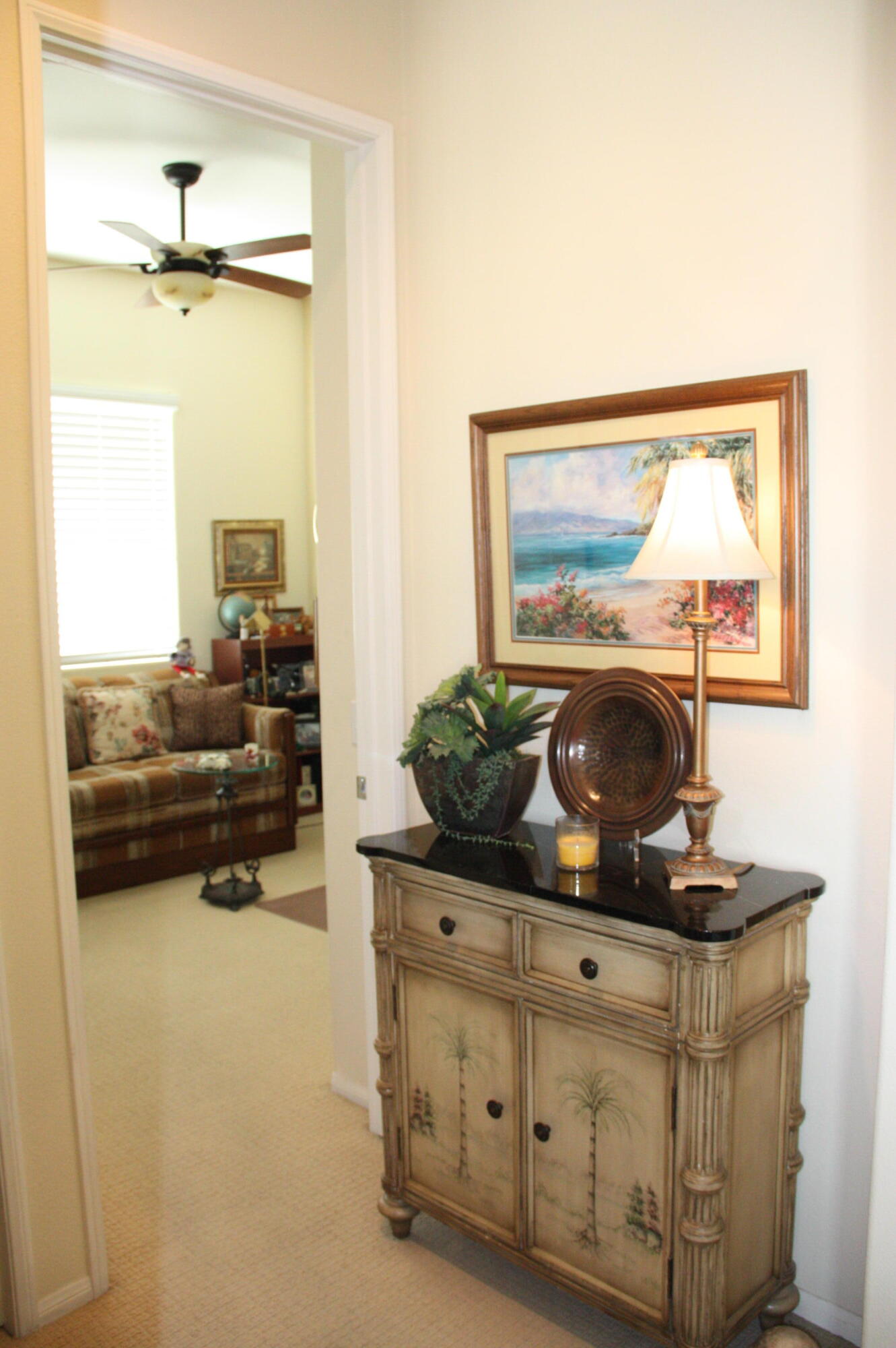 49758 Lewis Road Indio, CA 92201 - Photo 16 of 47 a living room with furniture and a flat screen tv