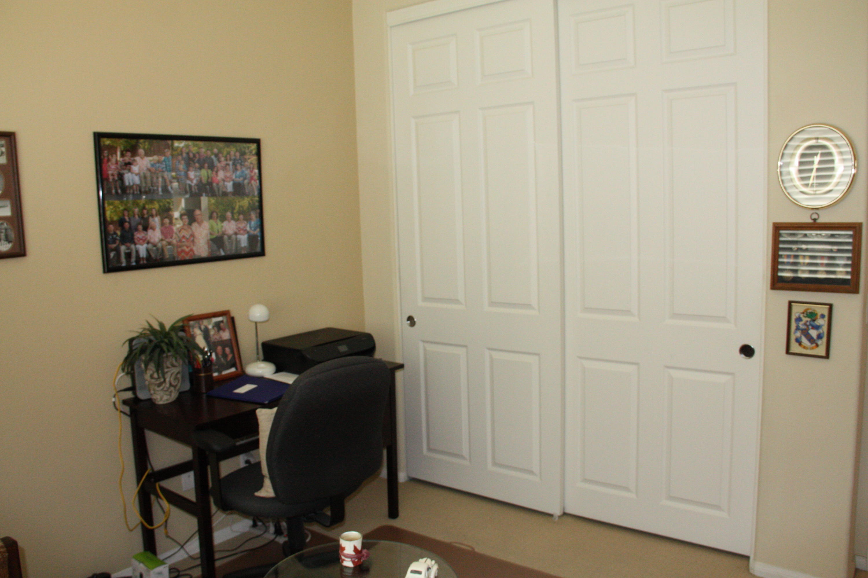 49758 Lewis Road Indio, CA 92201 - Photo 18 of 47 a view of a workspace with furniture and wooden floor