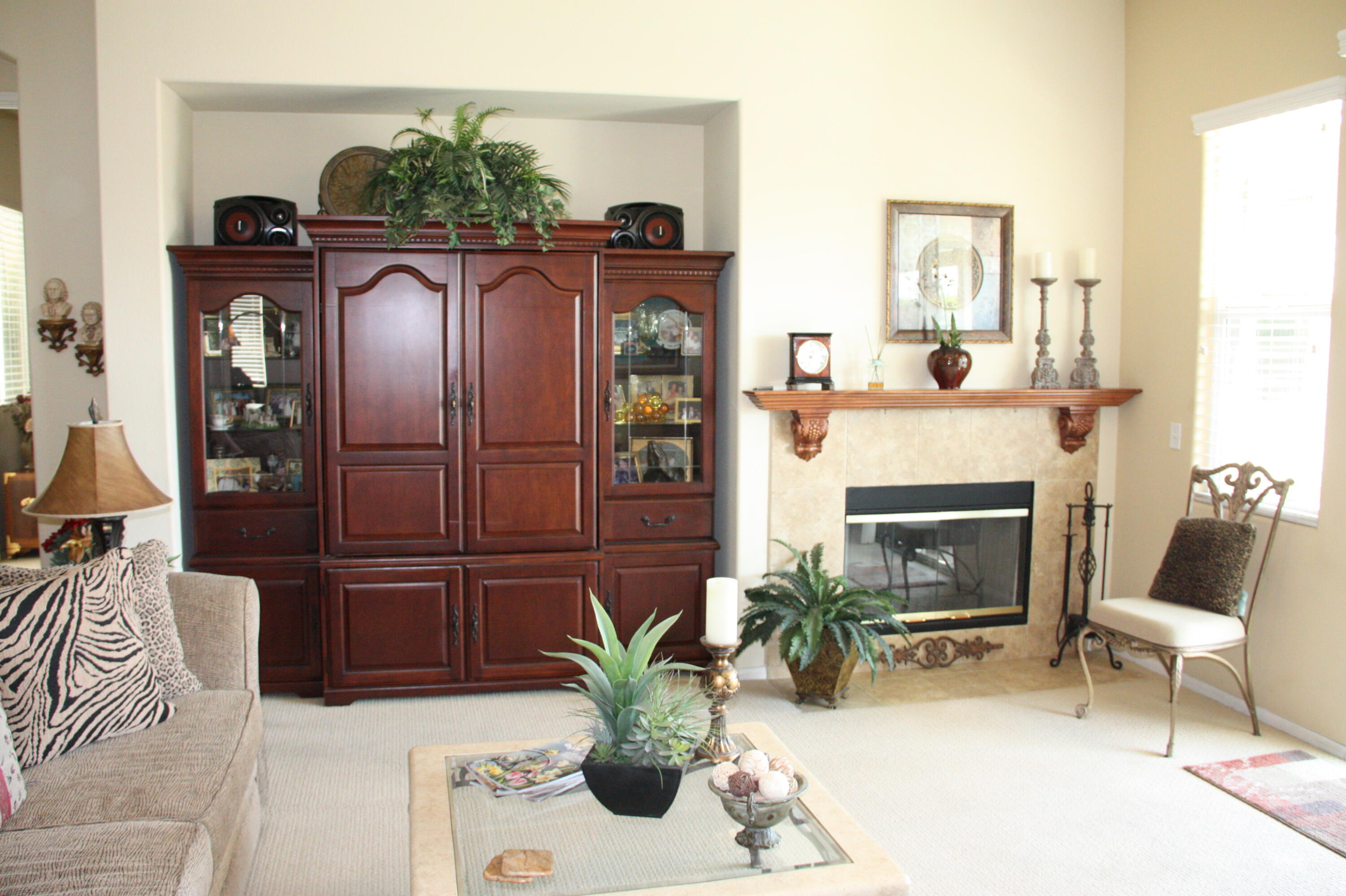 49758 Lewis Road Indio, CA 92201 - Photo 23 of 47 a living room with furniture and a fireplace