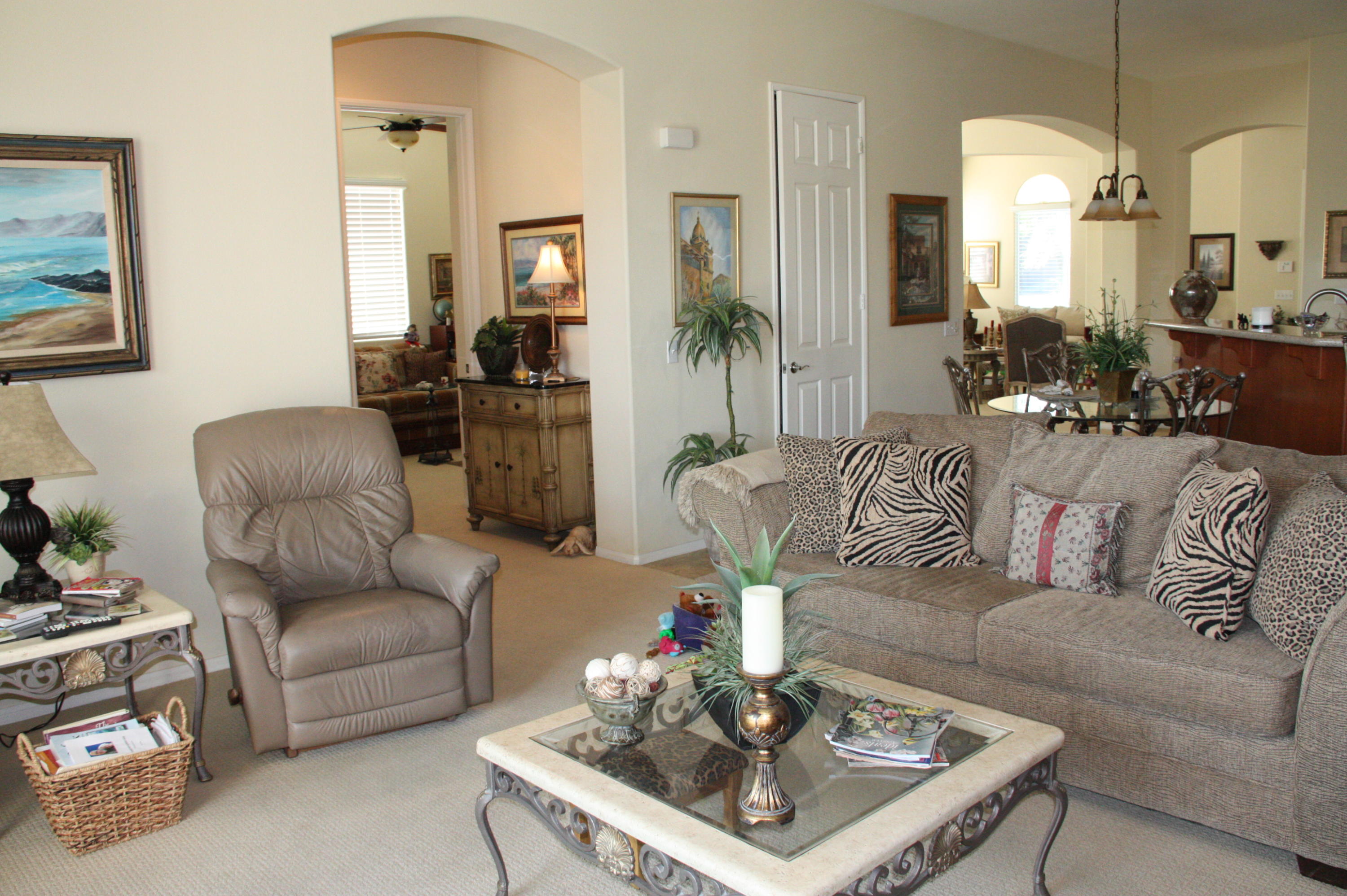 49758 Lewis Road Indio, CA 92201 - Photo 25 of 47 a living room with furniture and a table