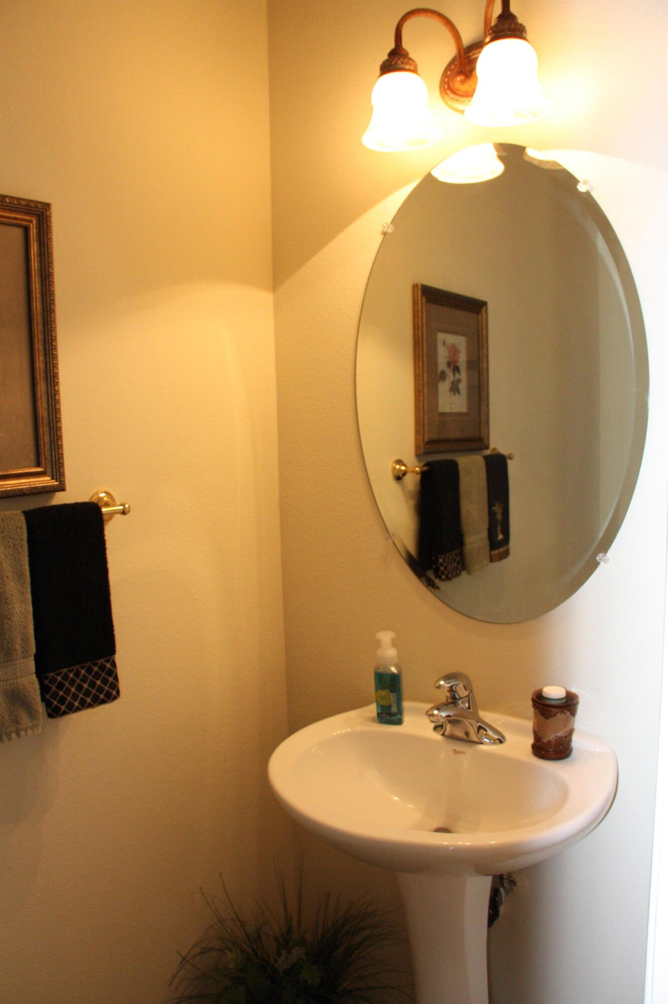 49758 Lewis Road Indio, CA 92201 - Photo 26 of 47 a bathroom with a sink and mirror
