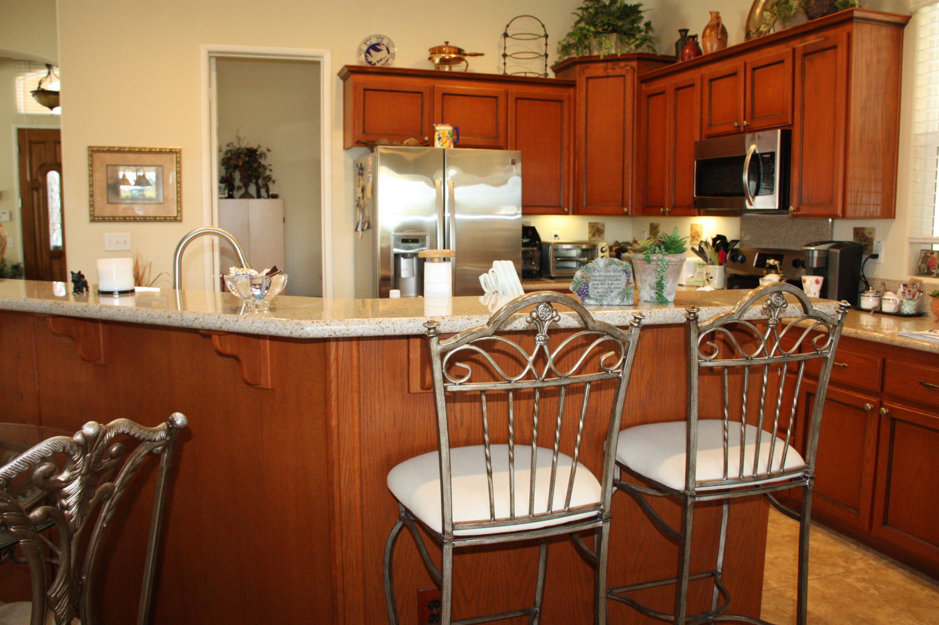 49758 Lewis Road Indio, CA 92201 - Photo 27 of 47 a view of a dining room with furniture
