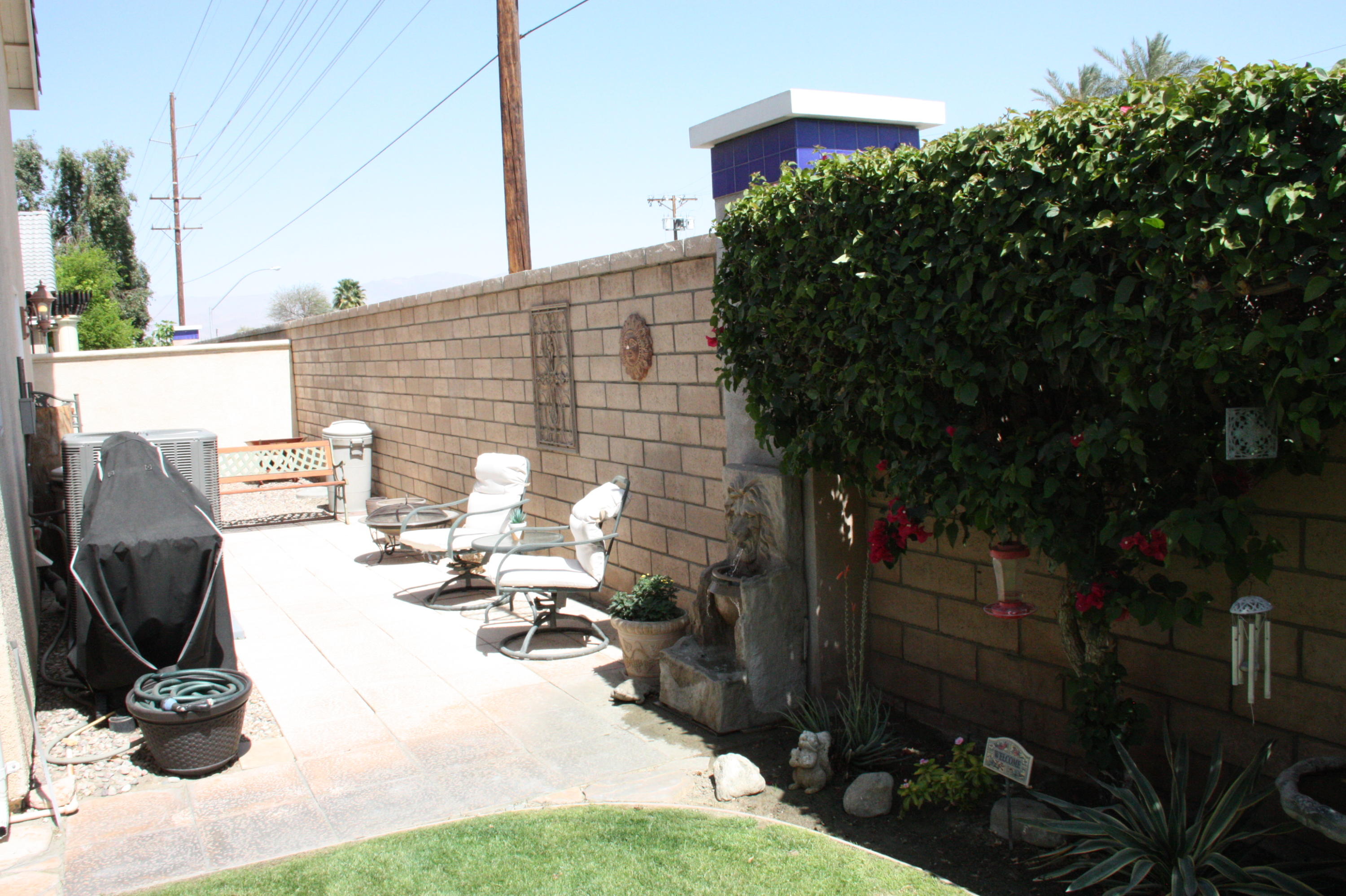49758 Lewis Road Indio, CA 92201 - Photo 43 of 47 a view of backyard with sitting area