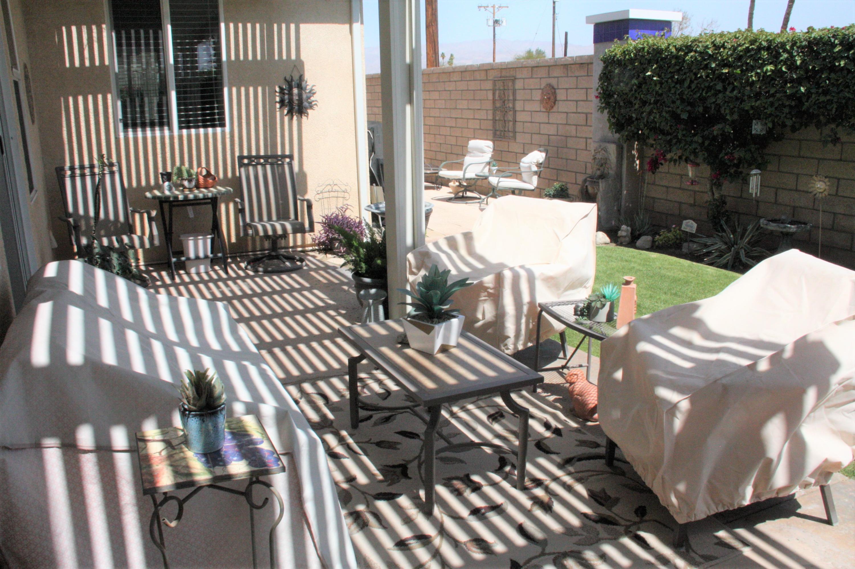 49758 Lewis Road Indio, CA 92201 - Photo 44 of 47 a view of a patio with wooden floor