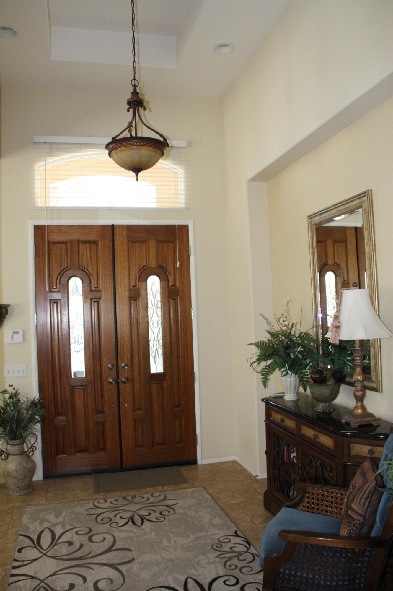 49758 Lewis Road Indio, CA 92201 - Photo 8 of 47 a living room with furniture and a potted plant