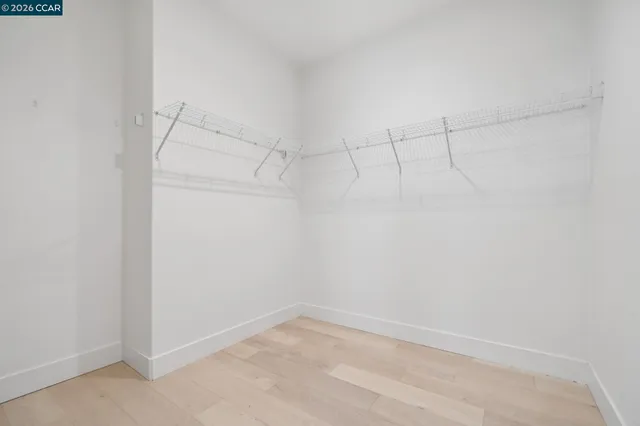 a view of a room with racks on the wall