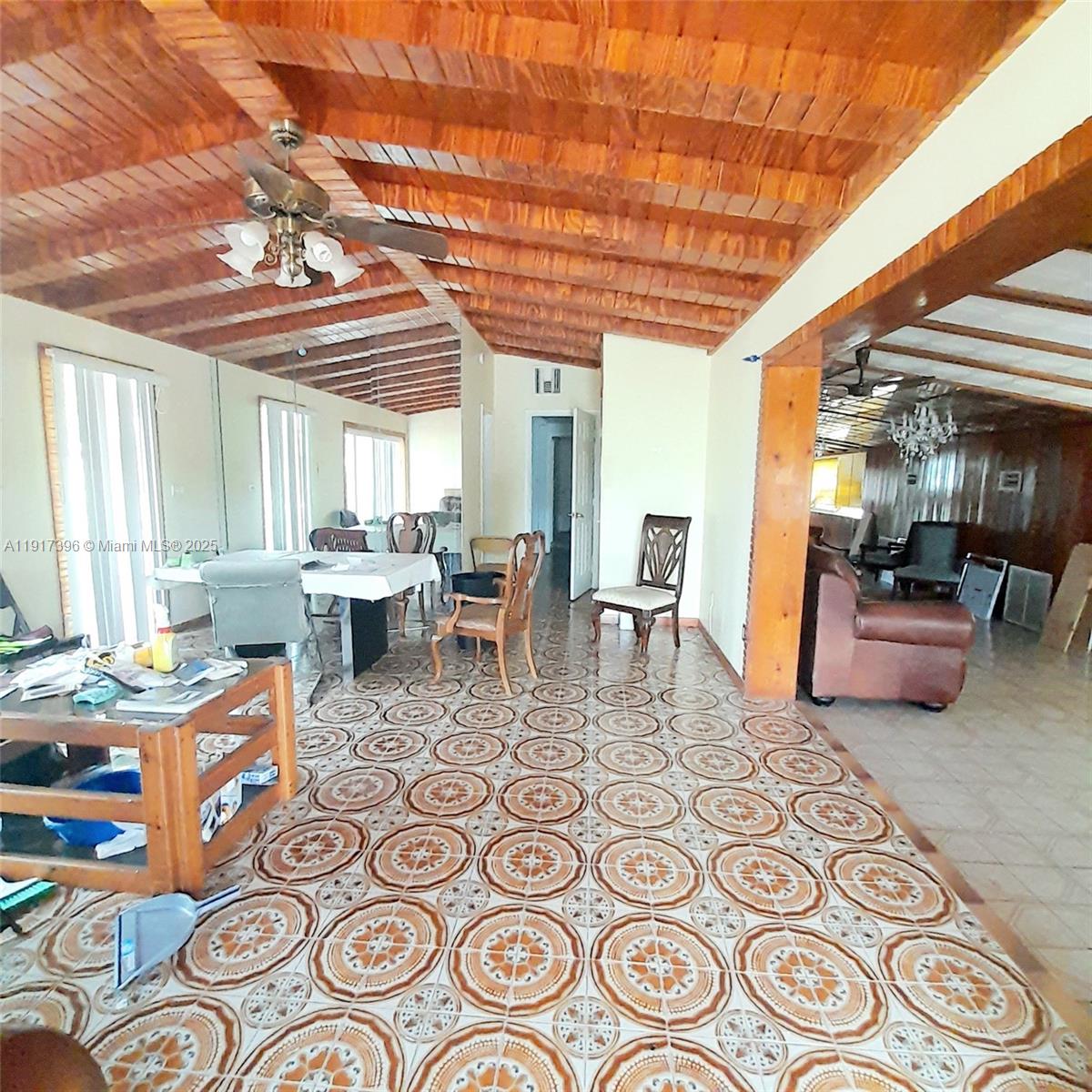 1830 Northeast 175th Street, Unit 1 North Miami Beach, FL 33162 - Photo 6 of 15 a view of a dining room with furniture