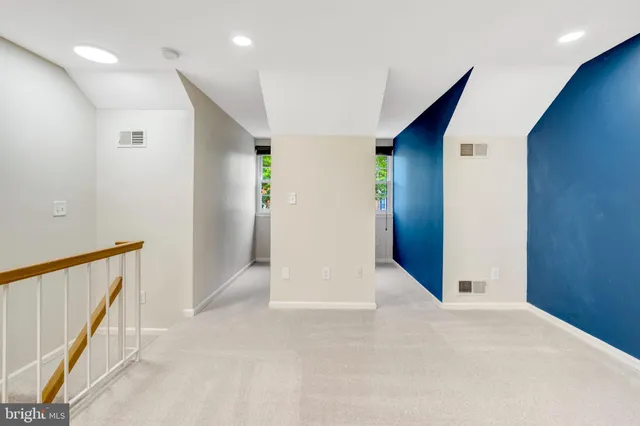 a view of hallway with stairs