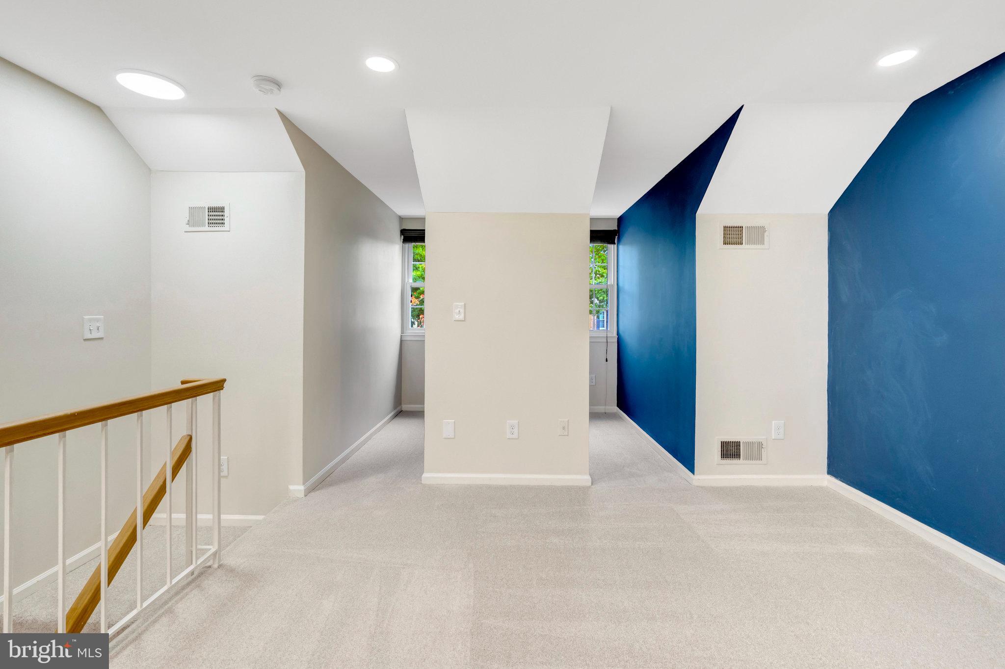 8482 Springfield Oaks Drive Springfield, VA 22153 - Photo 33 of 48 a view of hallway with stairs