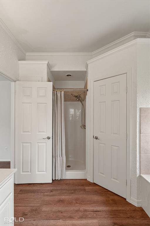 1962 Palmetto Road Benton, LA 71006 - Photo 19 of 40 The bathroom features a standalone shower with a shower curtain and a shower head