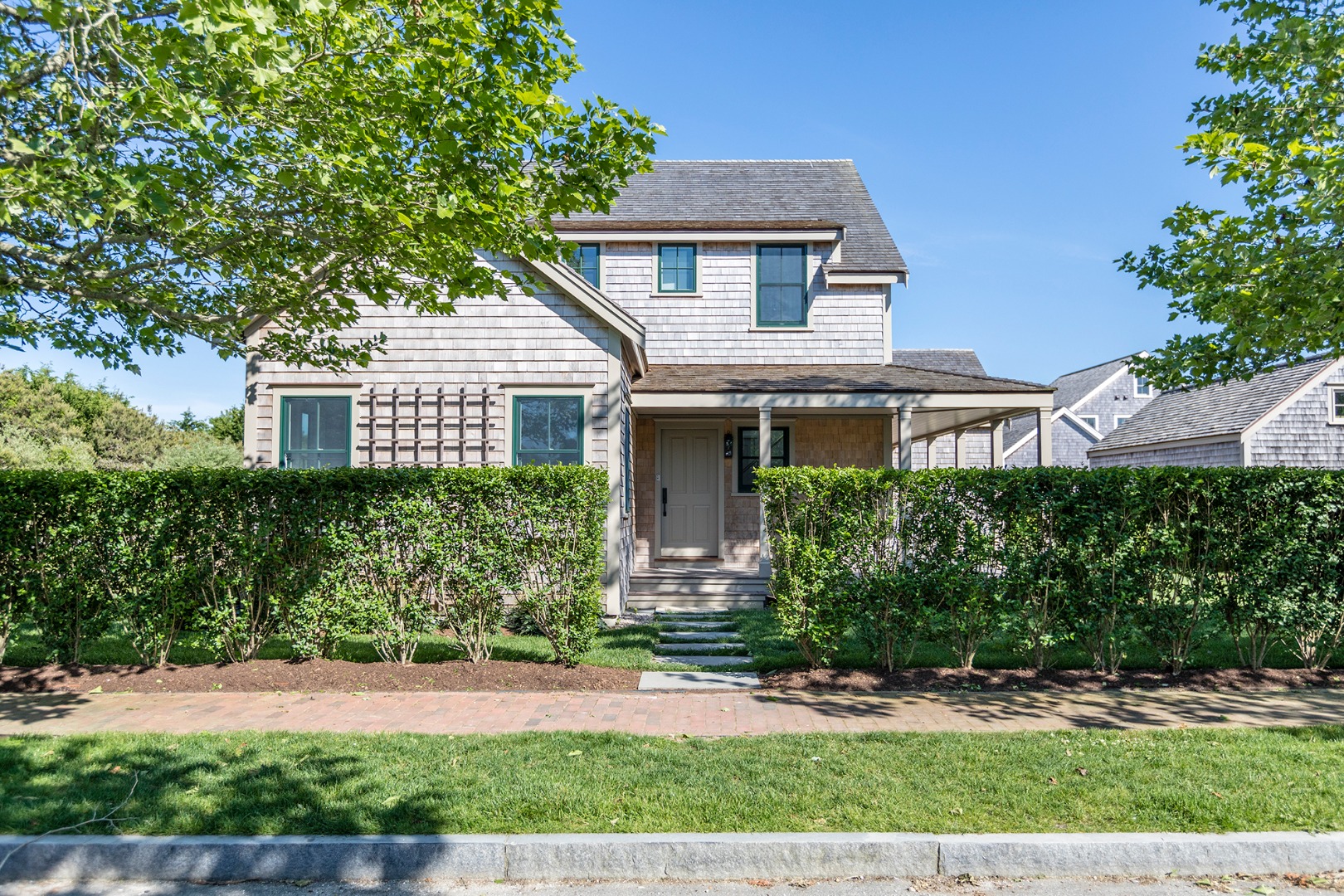 12 Wood Lily Road Nantucket, MA 02554 - Photo 3 of 70 front view of a house