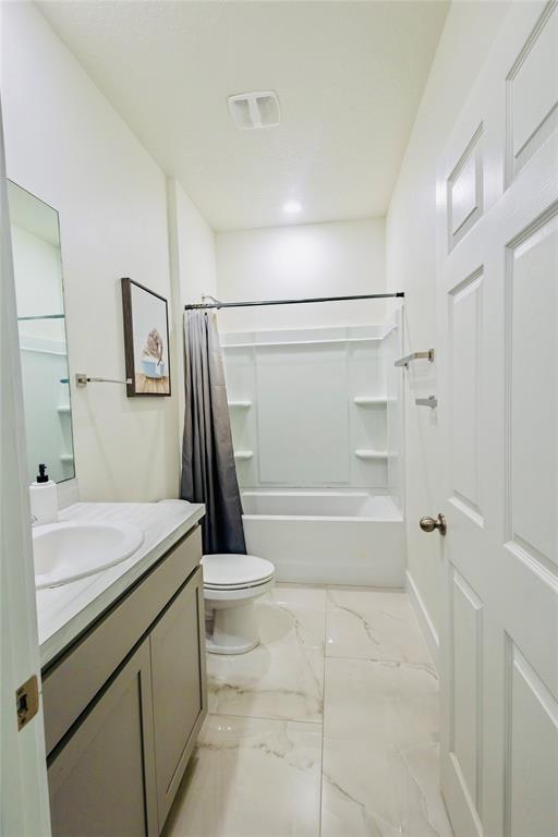 2149 Southwest Susset Lane Port St. Lucie, FL 34953 - Photo 20 of 47 a bathroom with a sink a toilet and shower