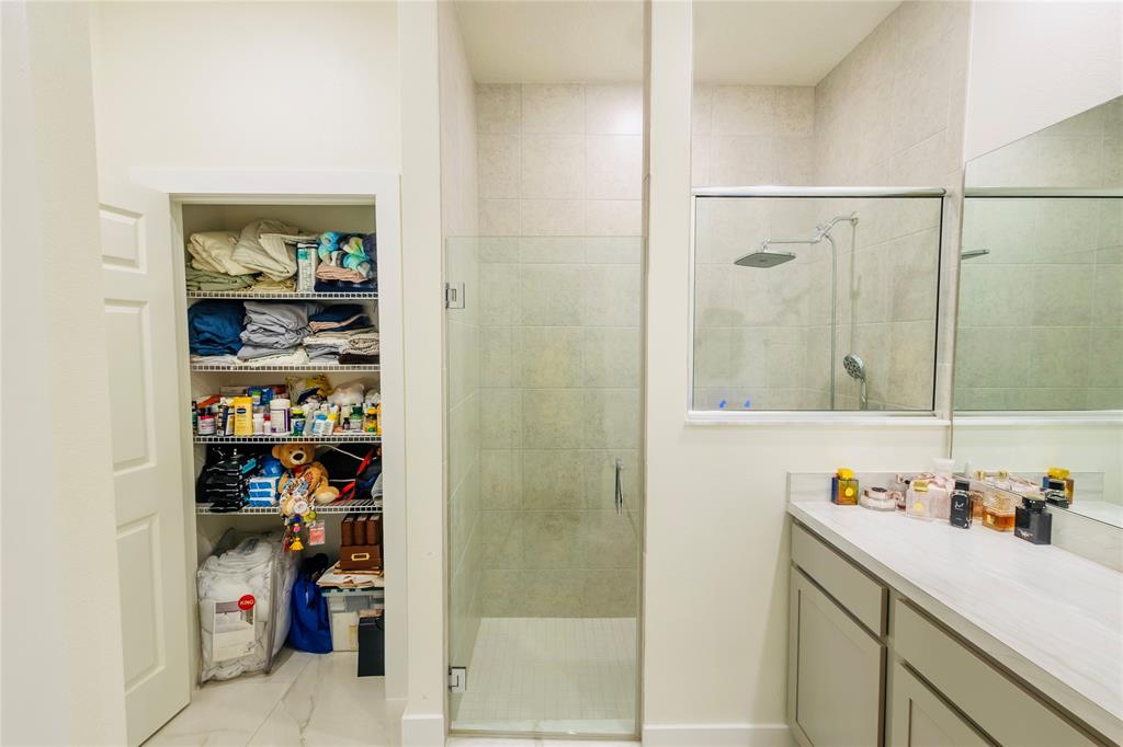 2149 Southwest Susset Lane Port St. Lucie, FL 34953 - Photo 35 of 47 a bathroom with a sink and a shower
