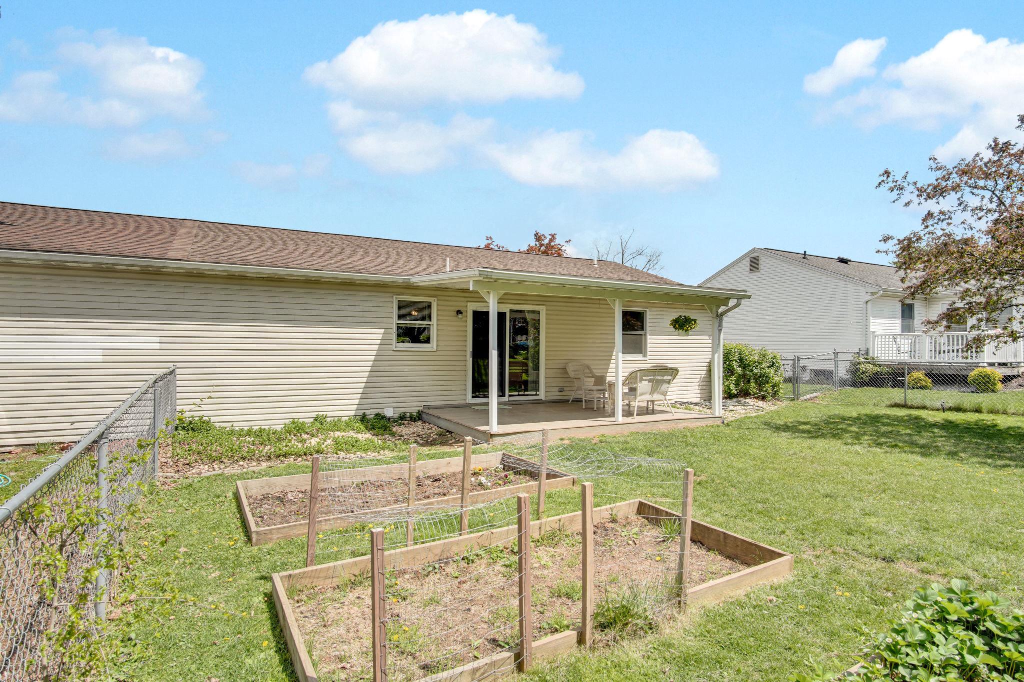 12 Furman Road Dillsburg, PA 17019 - Photo 29 of 33 Charming backyard with garden beds.
