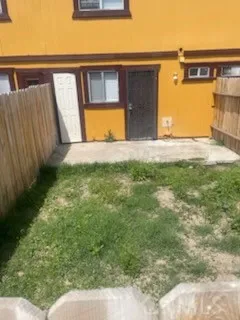 a view of a house with backyard