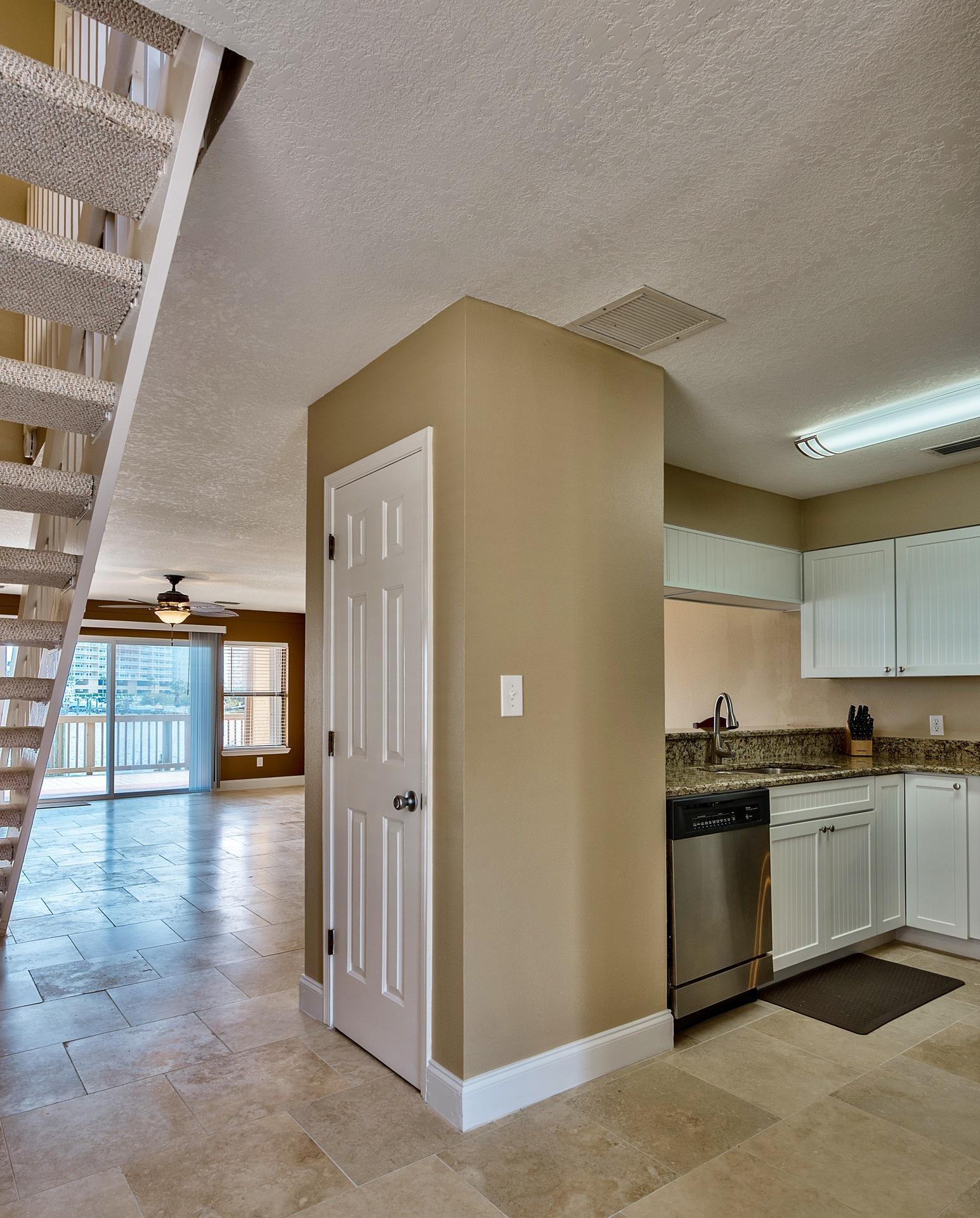 28 Moreno Point Road, Unit E Destin, FL 32541 - Photo 14 of 54 Entranceway to kitchen and living room