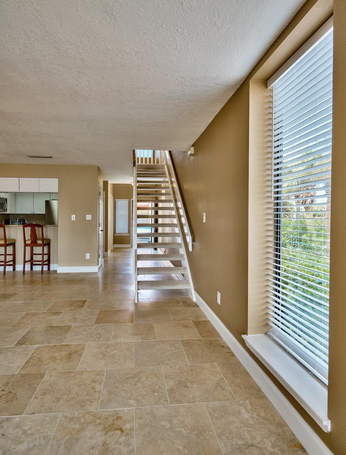 28 Moreno Point Road, Unit E Destin, FL 32541 - Photo 15 of 54 Stairway leading 2nd level